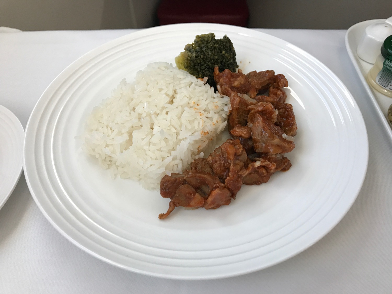 a plate of rice and meat