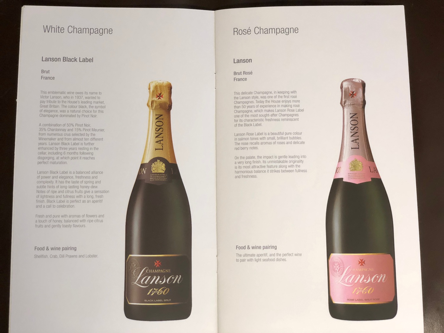 a book with a picture of champagne bottles