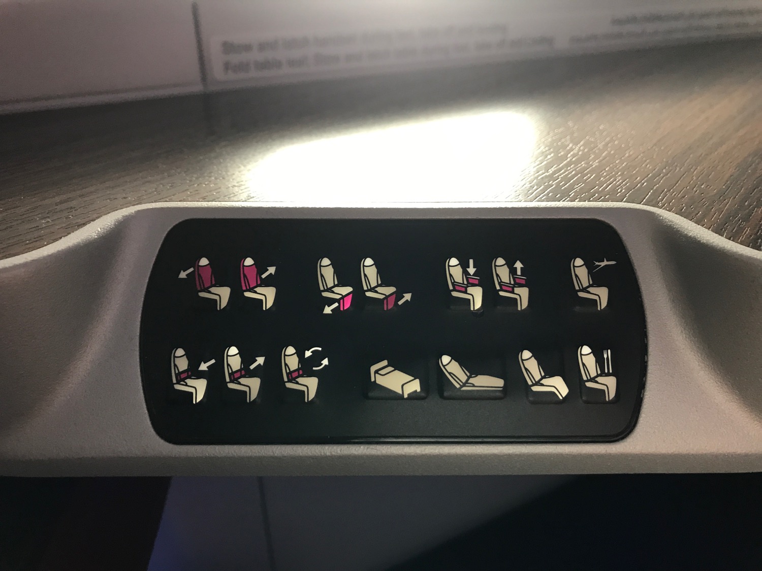 a seat buttons on a plane