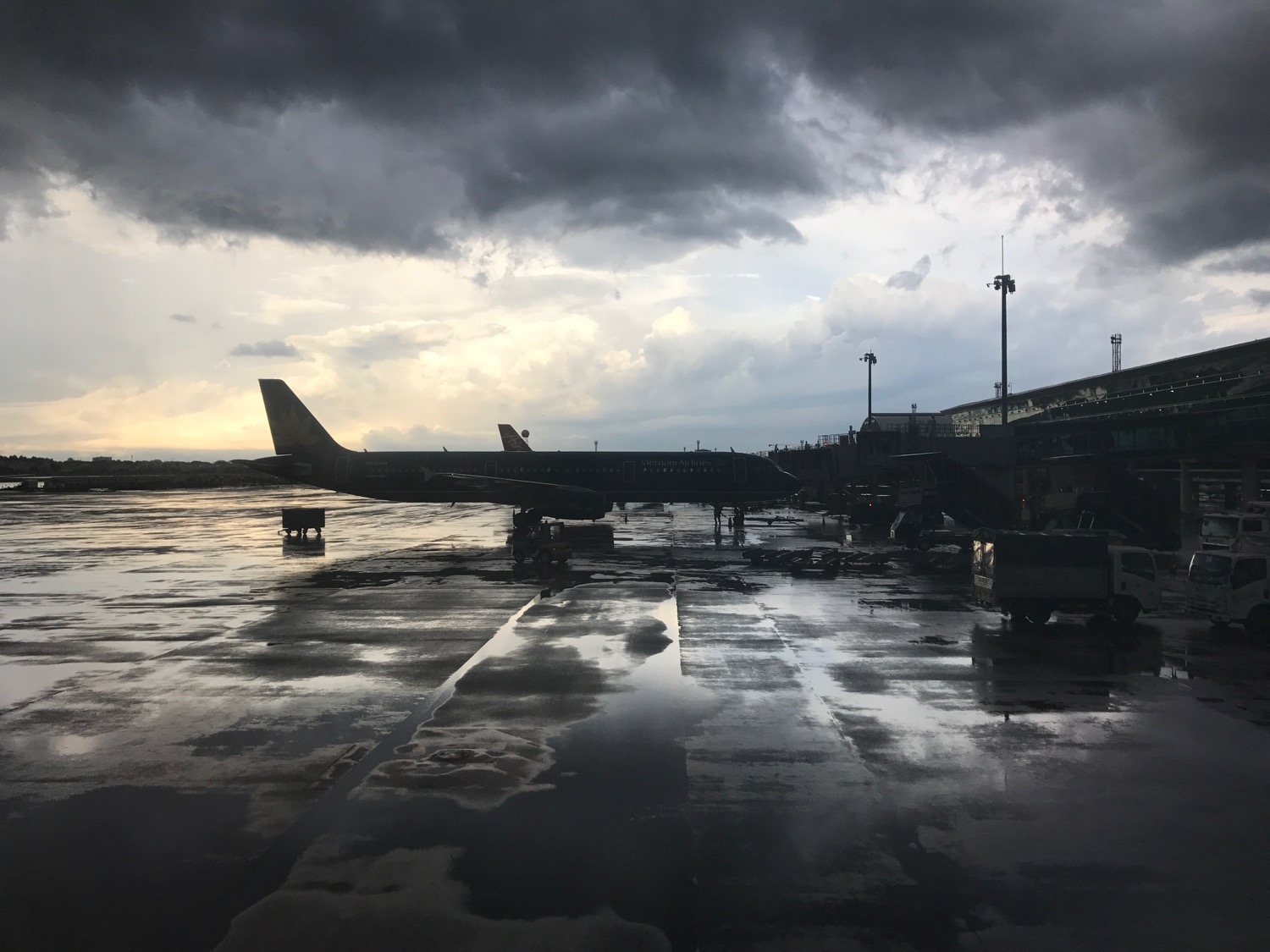 an airplane on a wet runway