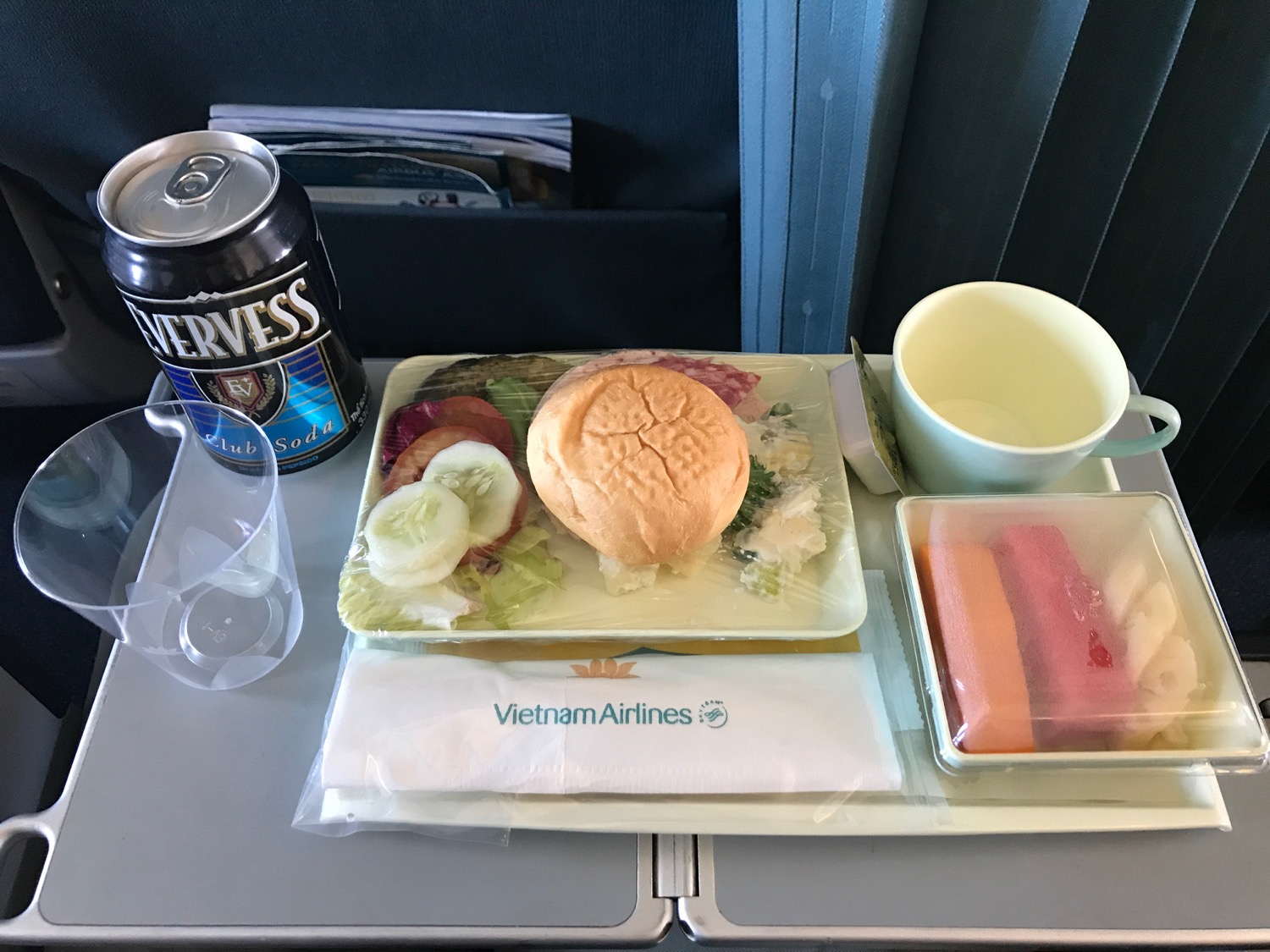 a tray with food and drink on a table