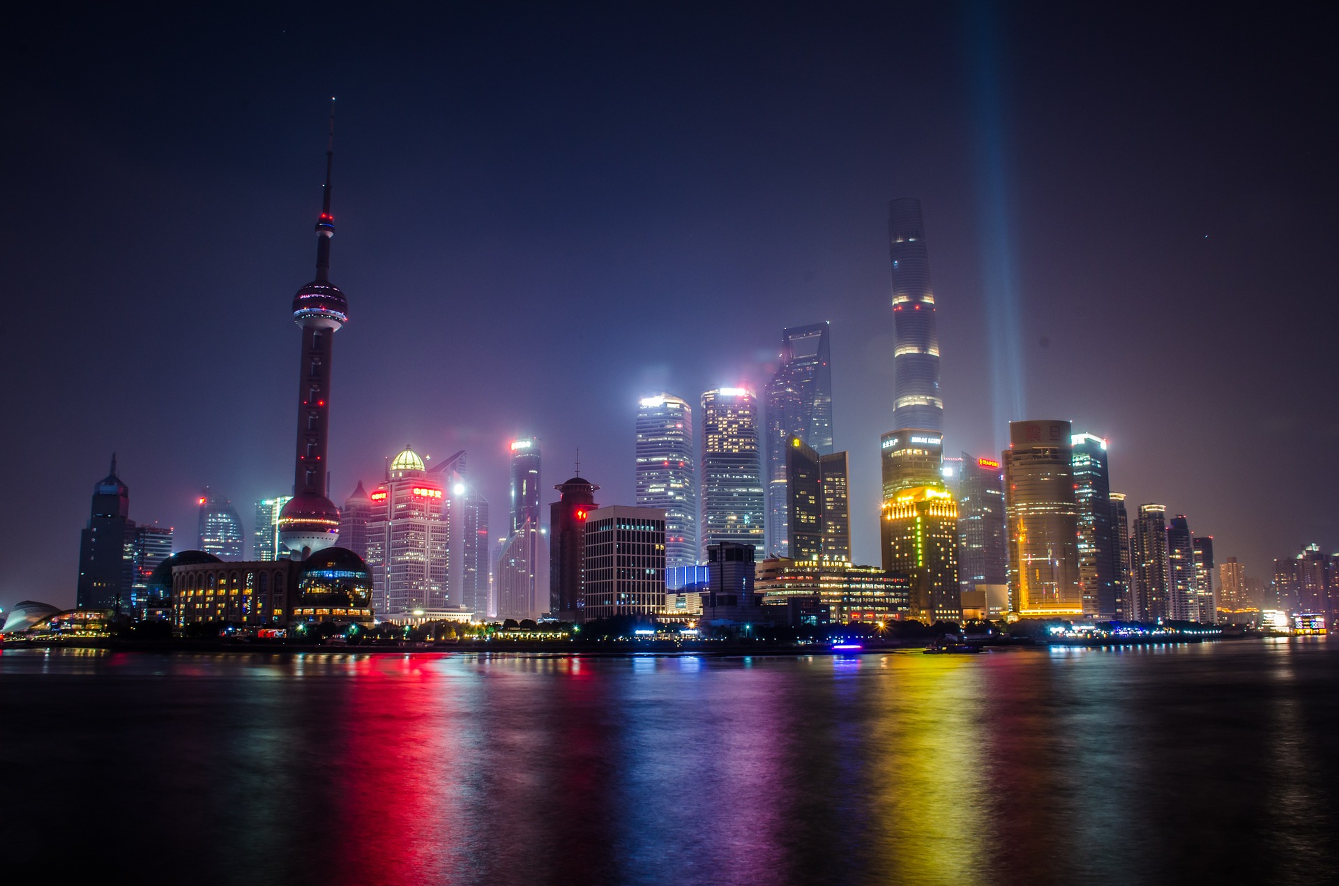The Bund skyline with lights and a body of water