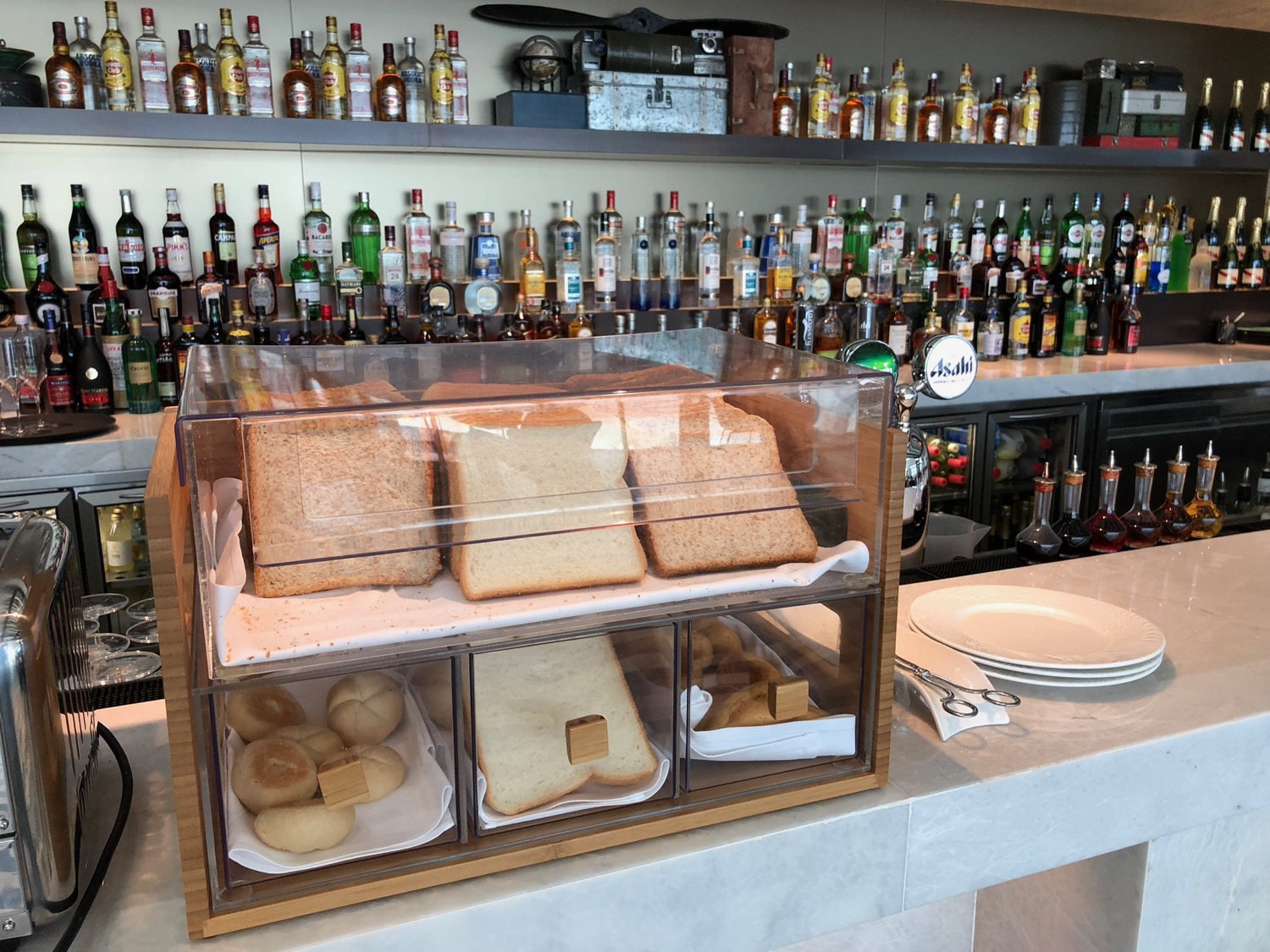 a display case with bread in it