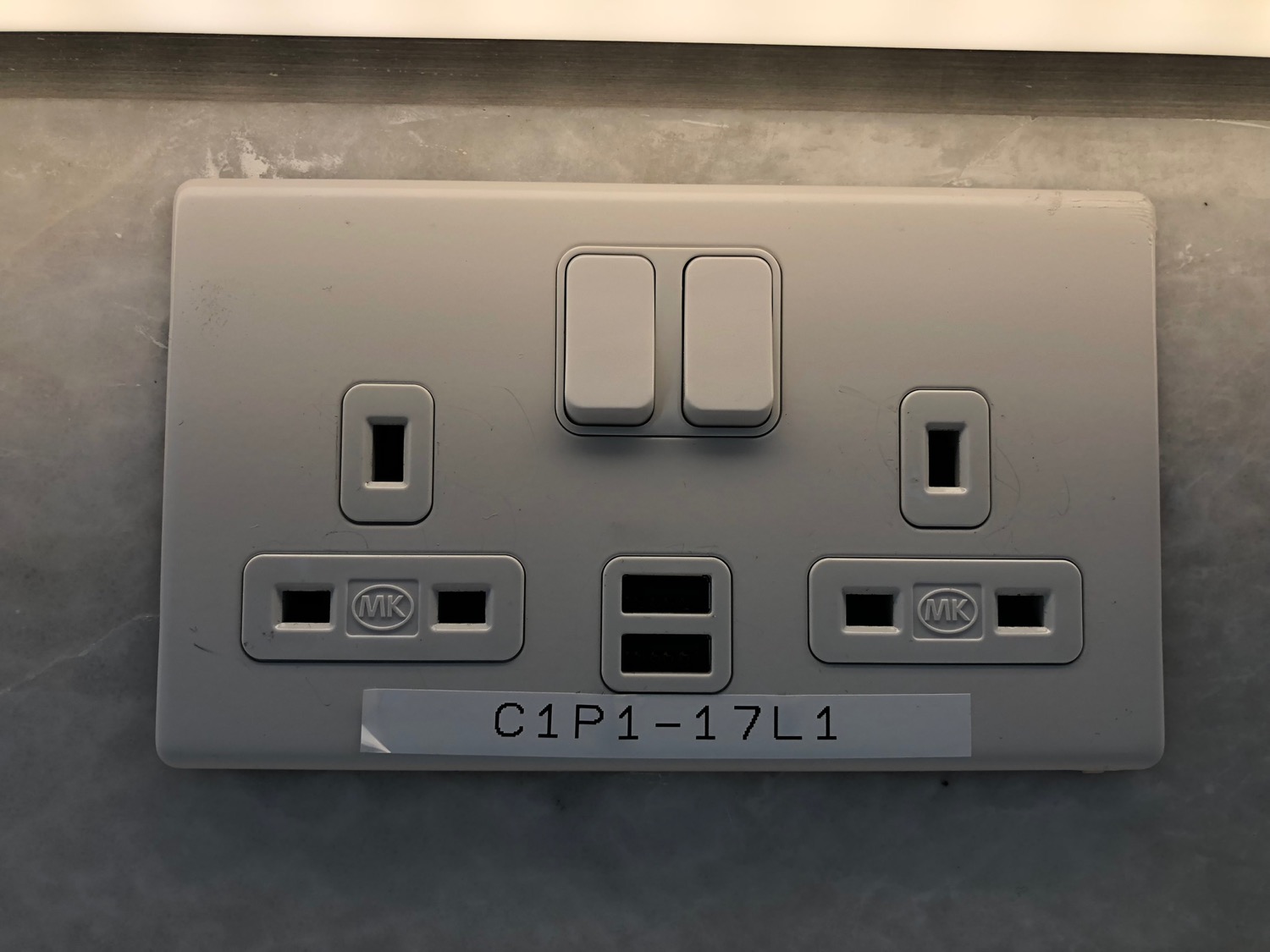 a white outlet with switches and buttons
