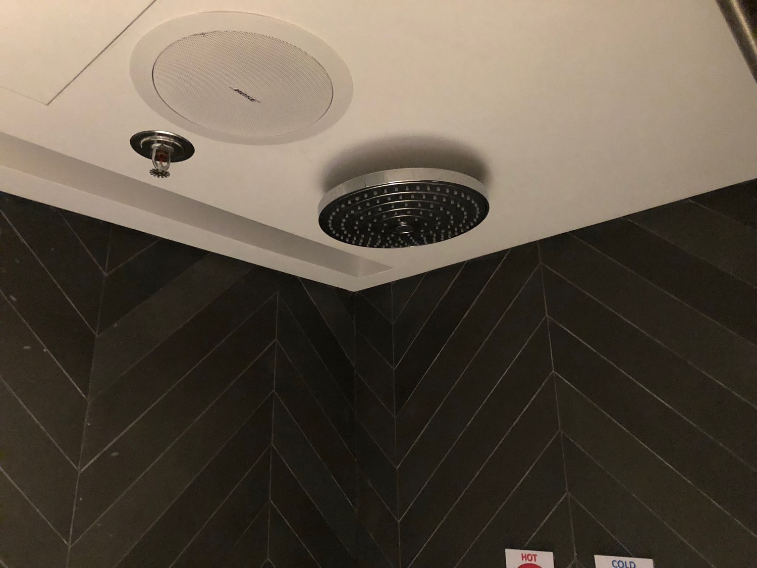 a shower head on the ceiling