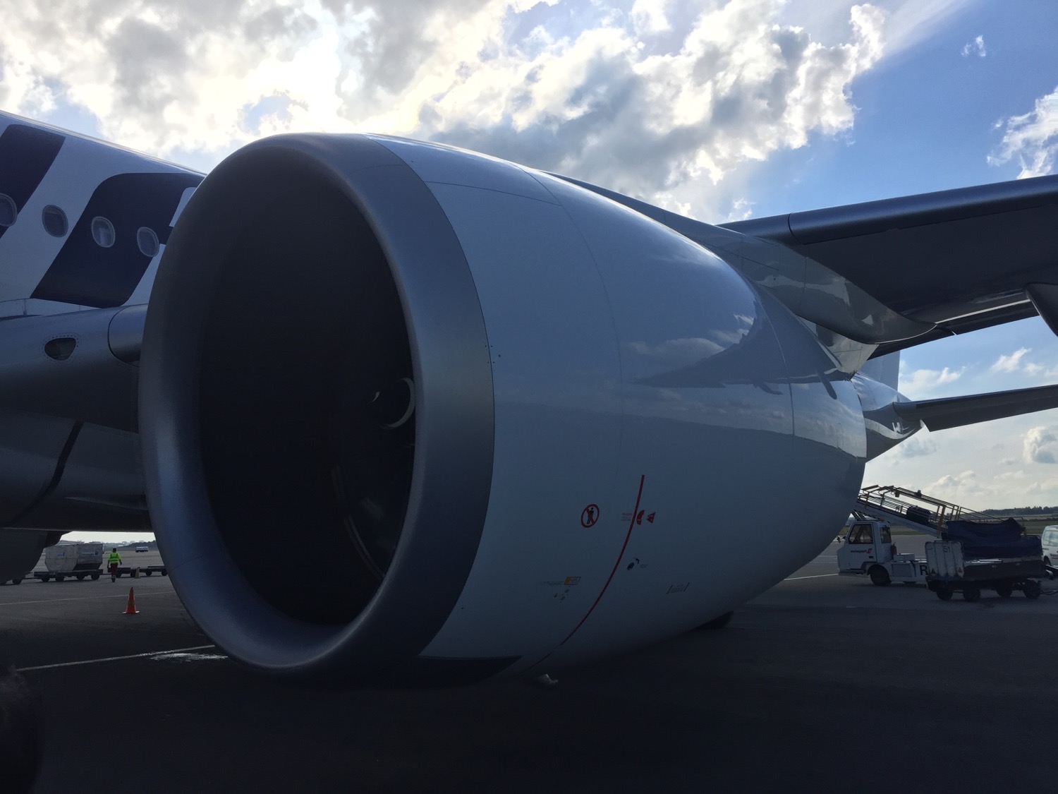 a large jet engine on a runway