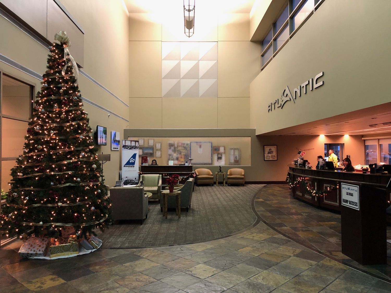a christmas tree in a lobby