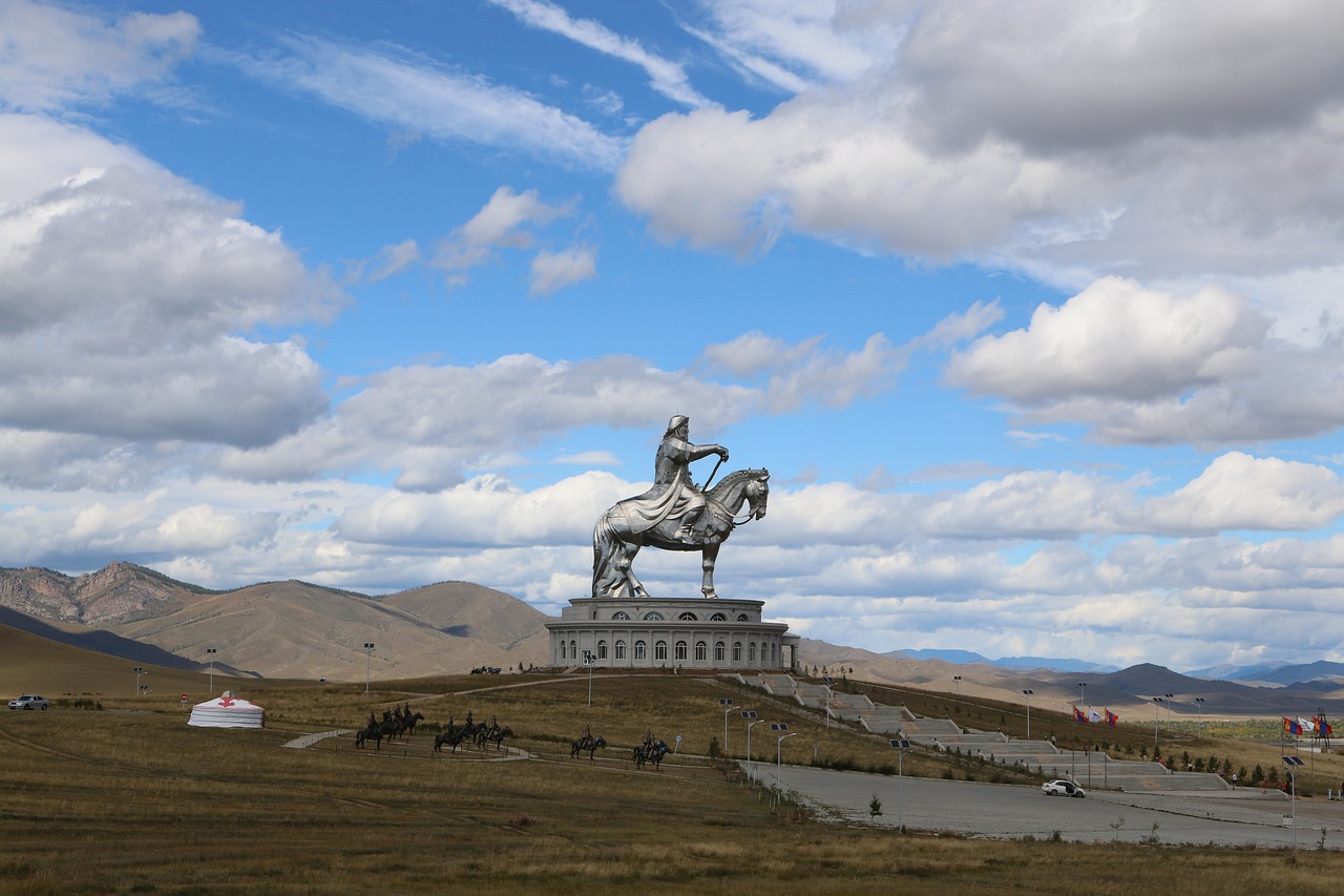 a statue of a man on a horse on a hill