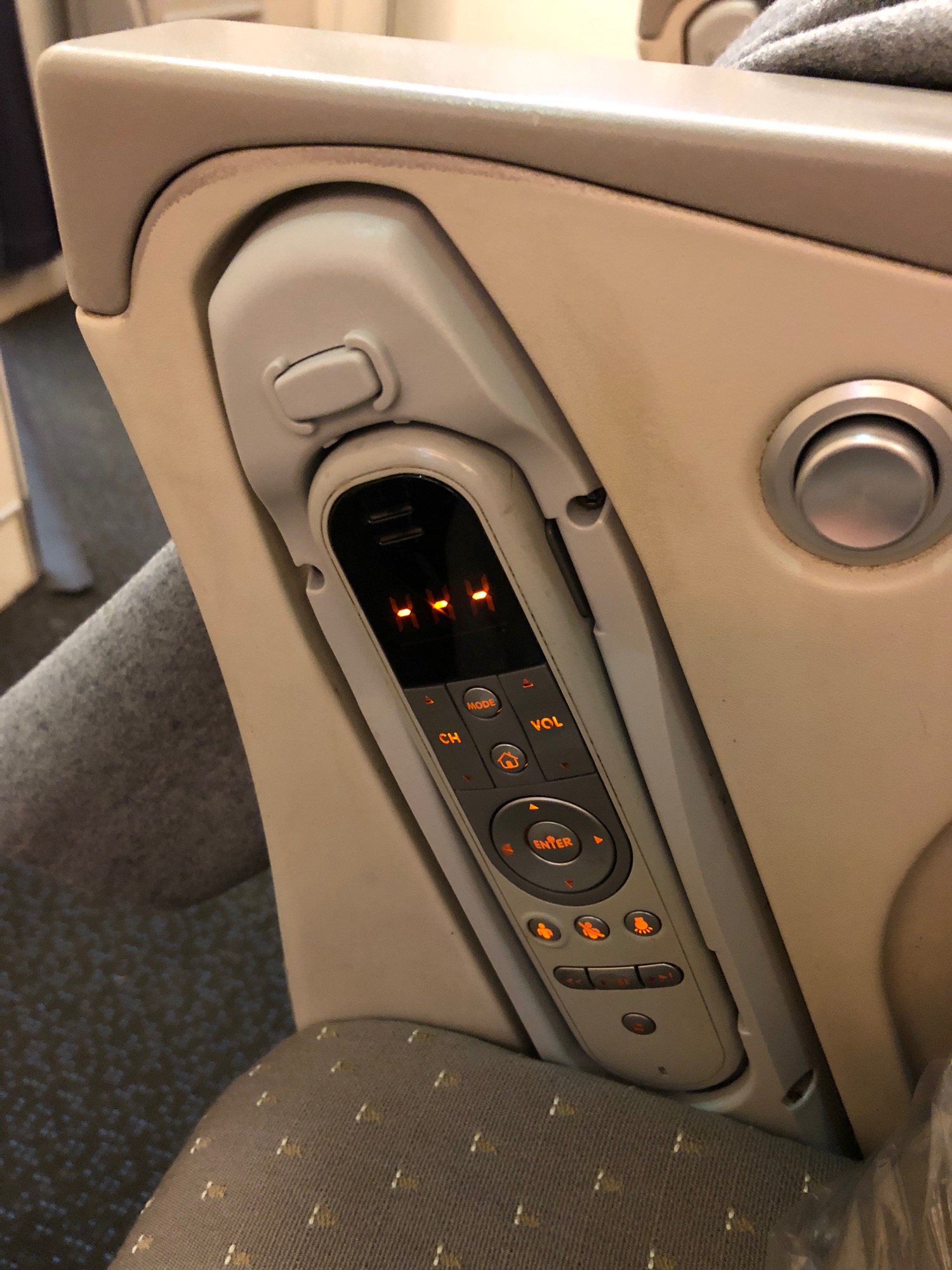 a car console with buttons and lights