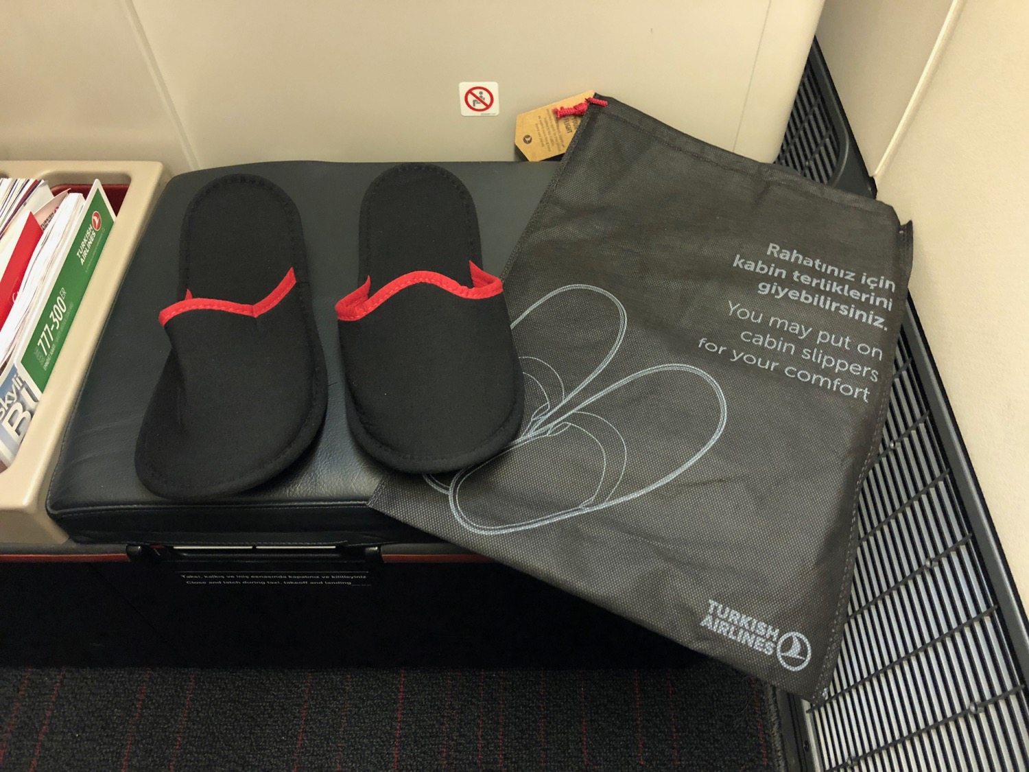 slippers on a black bag