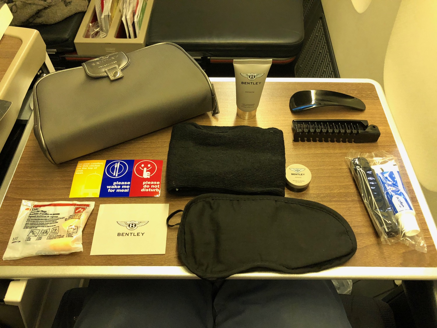 a table with a bag and other items on it