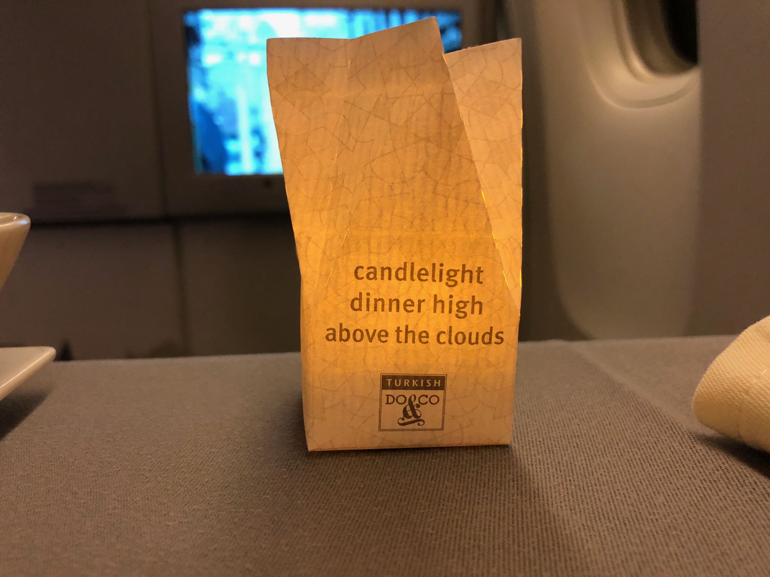 a paper bag on a plane
