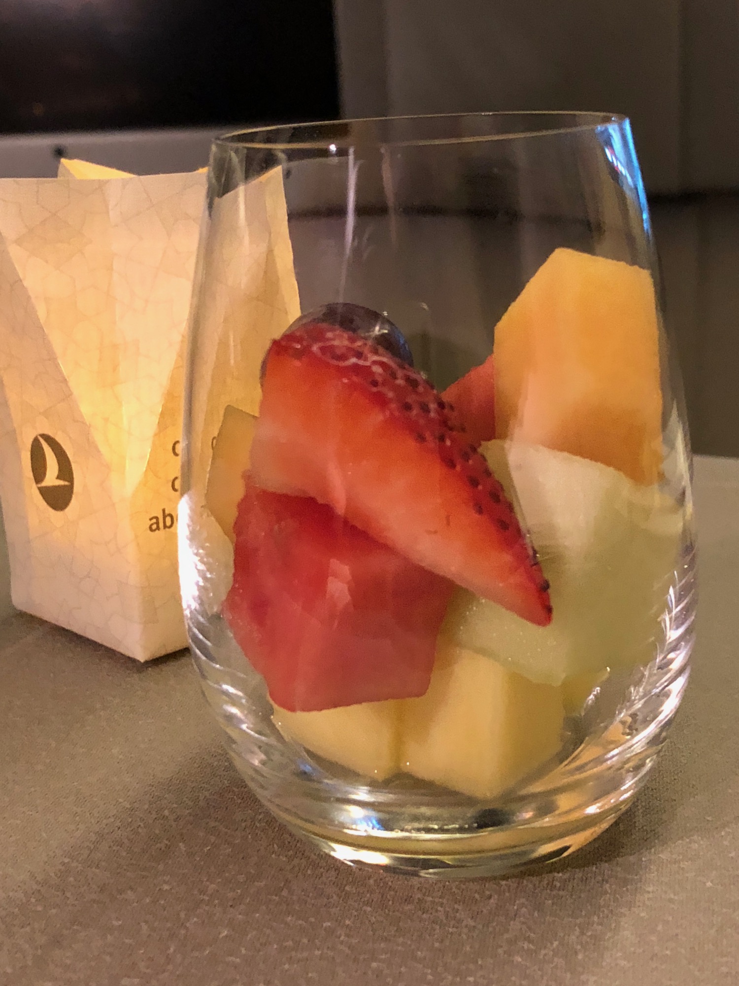 a glass of fruit in a bag