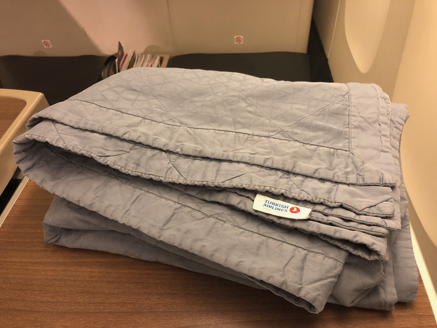 a folded blanket on a table