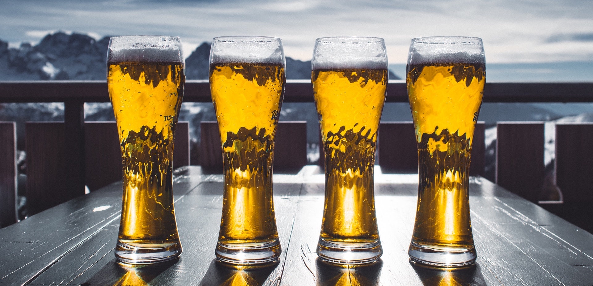 a row of glasses of beer