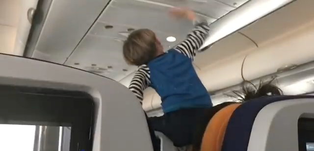 a child on an airplane