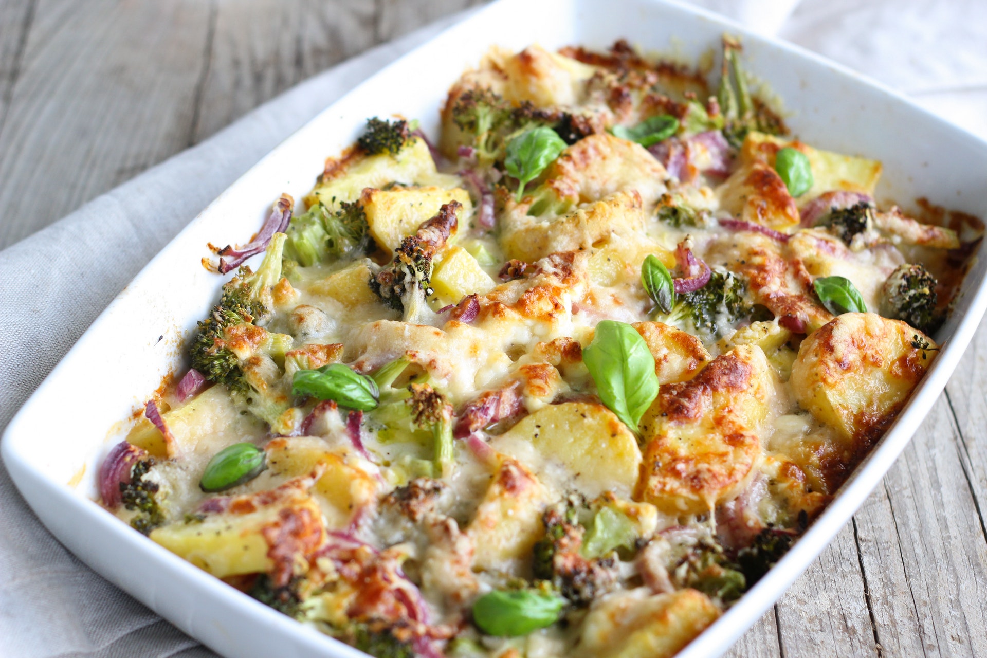 a casserole with broccoli and potatoes