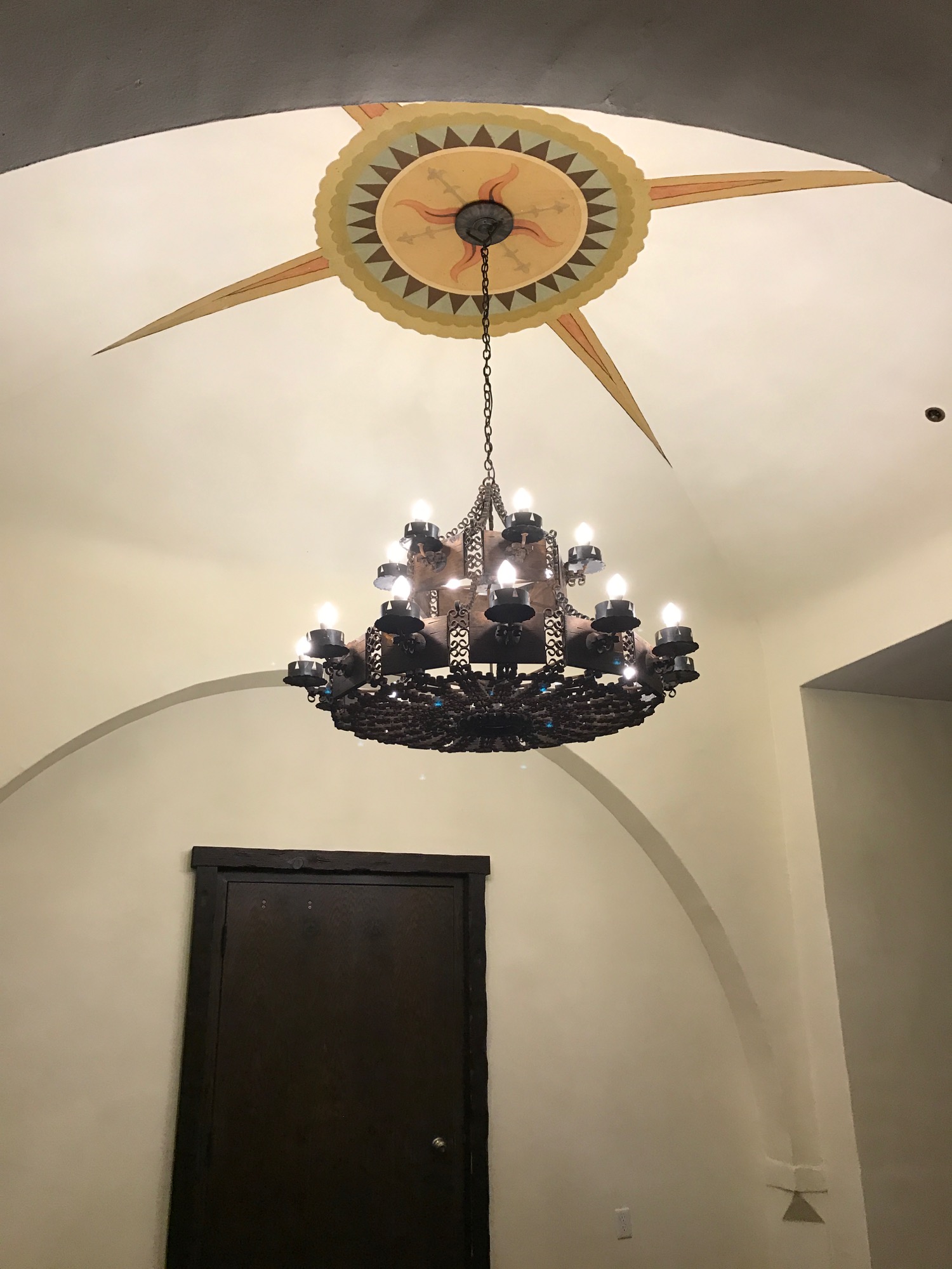 a chandelier from the ceiling