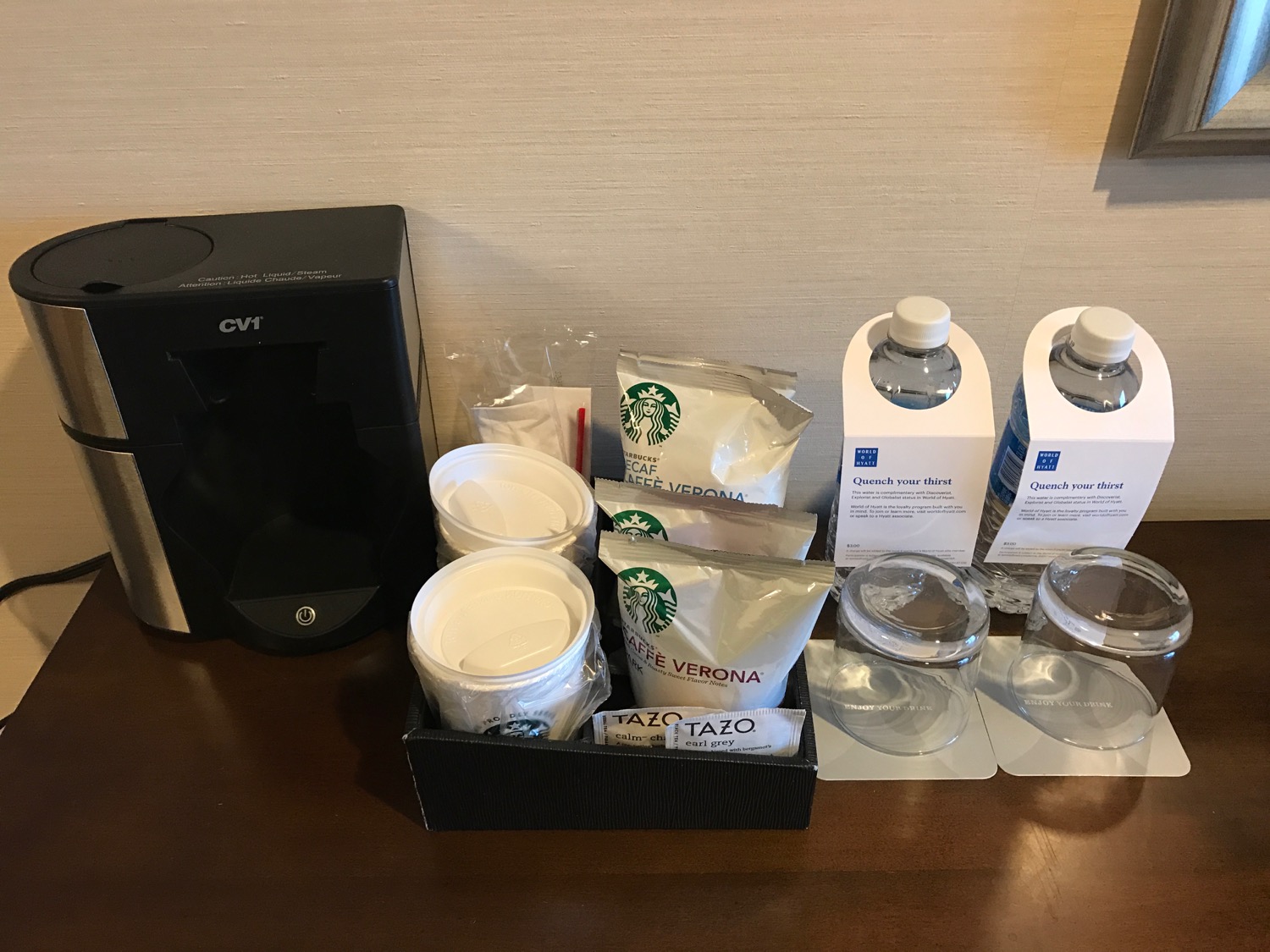 a coffee machine and coffee cups