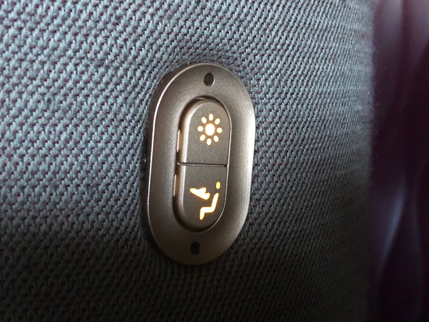 a button on a seat