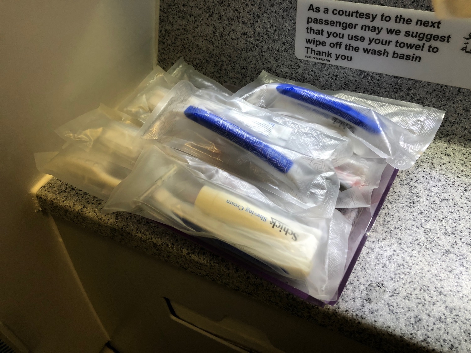 a group of toothbrushes in plastic bags