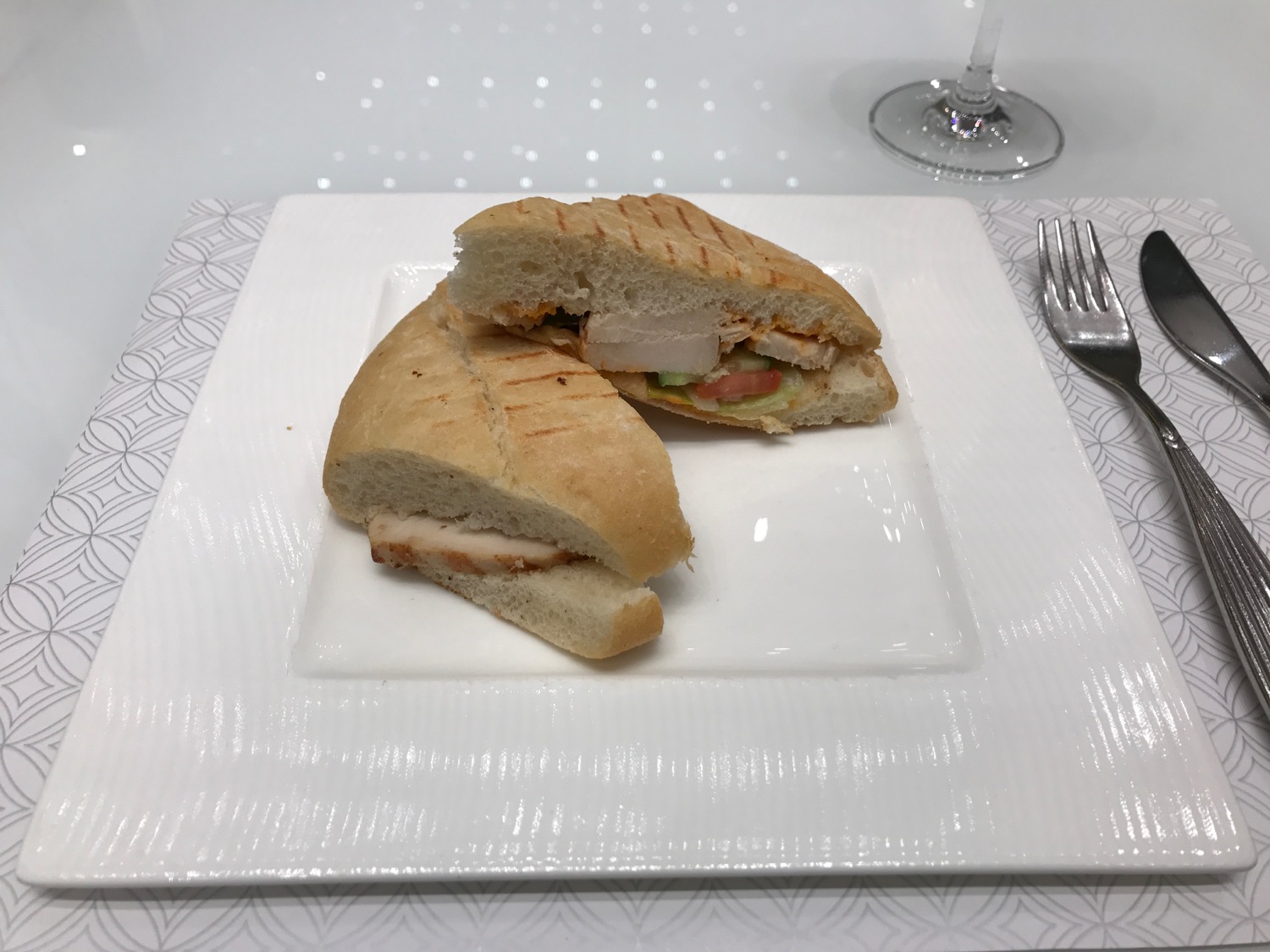 a sandwich cut in half on a plate