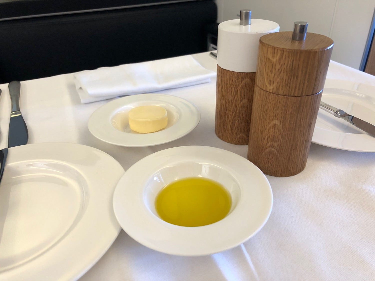 a table with plates and butter on it