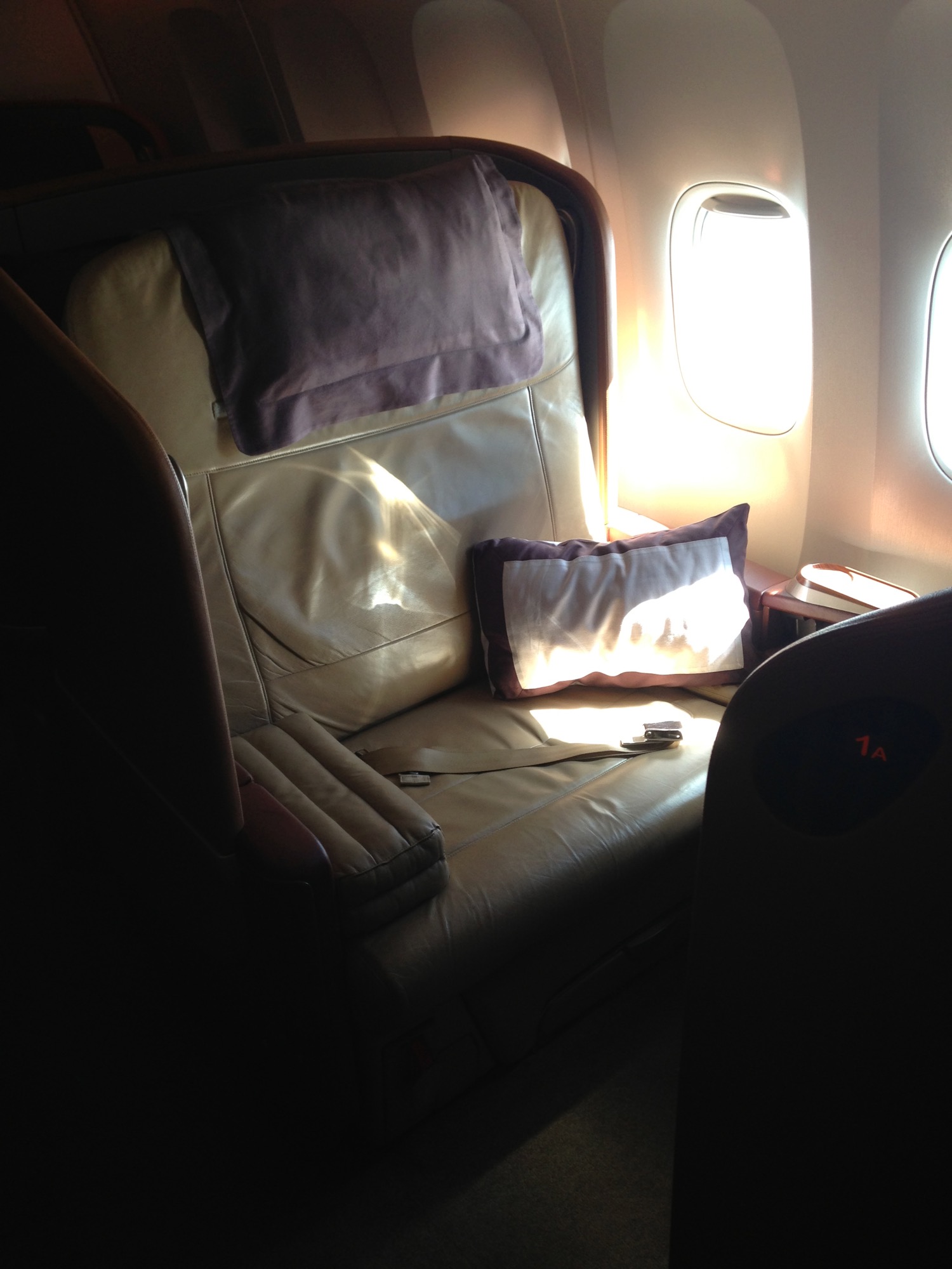 a seat with pillows on it