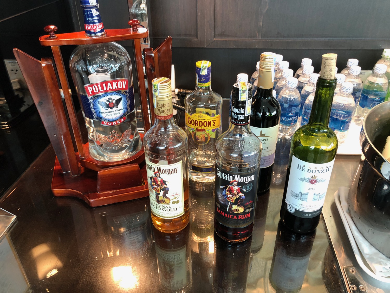 a group of bottles of liquor on a table