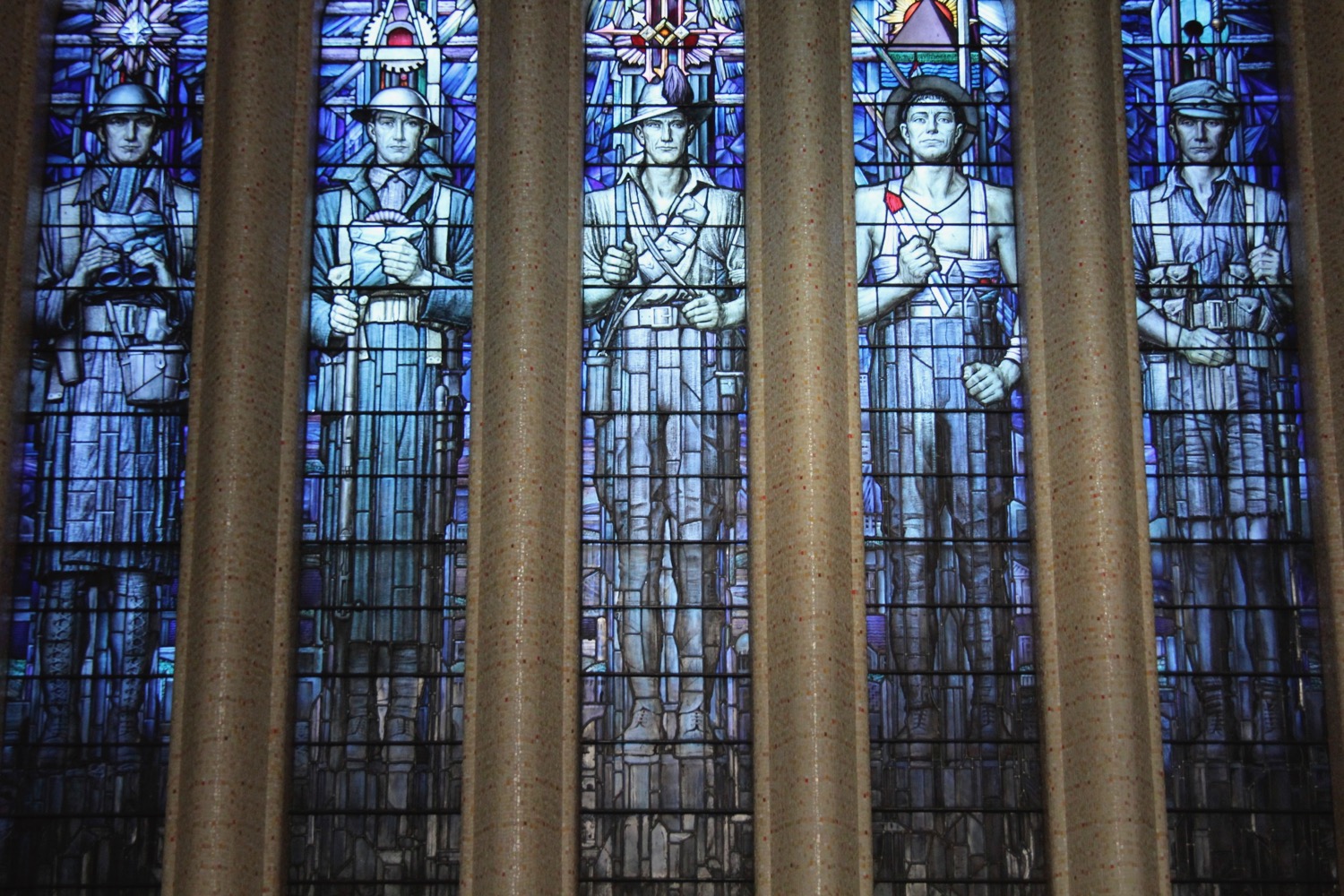 a stained glass window with several men holding guns