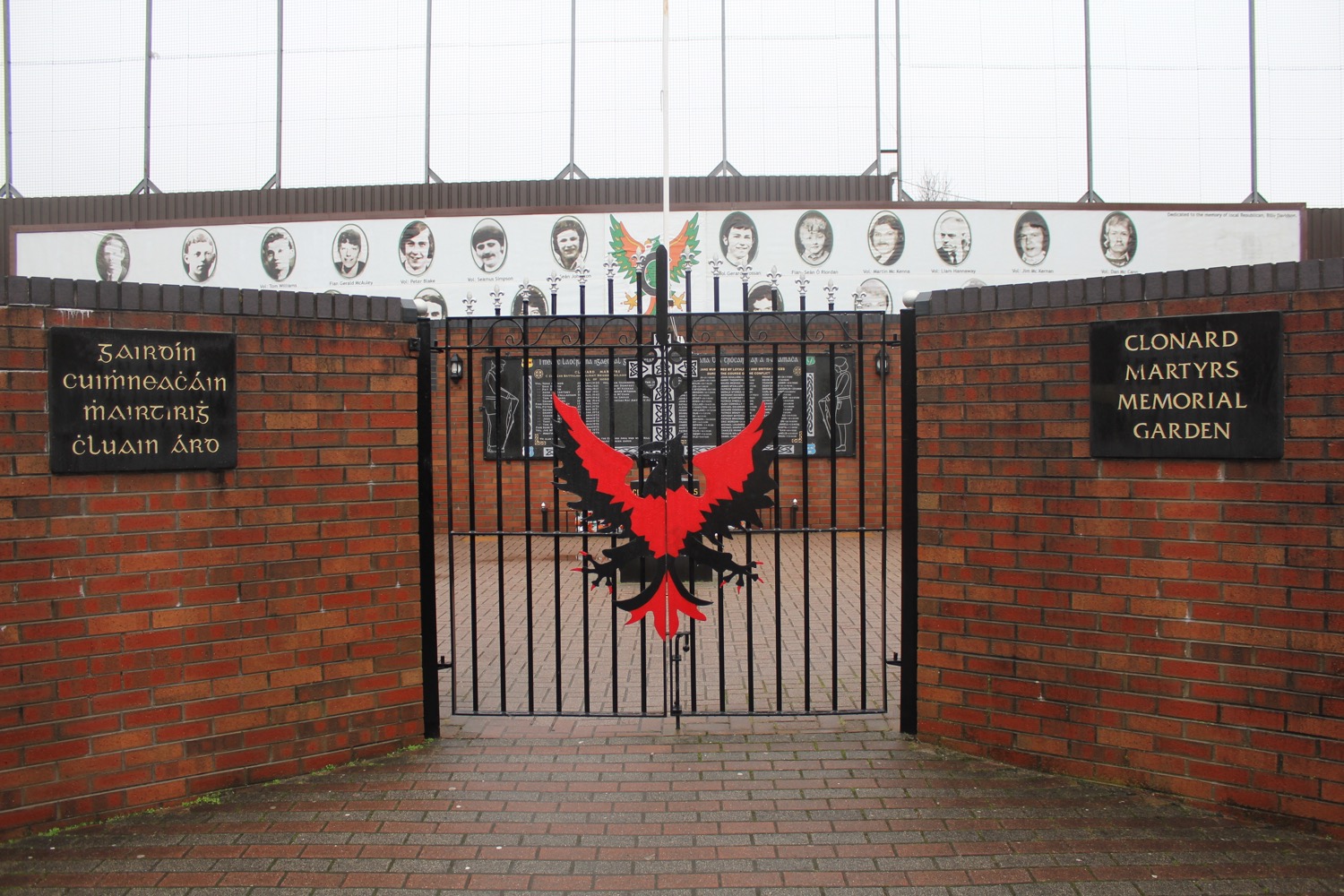 a gate with a red and black graphic on it