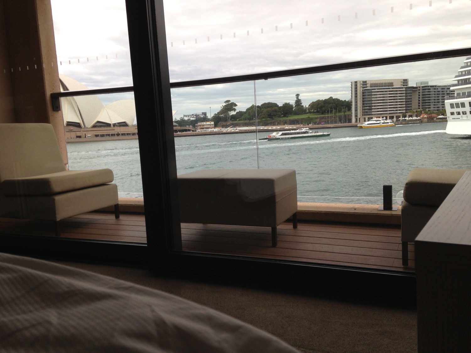 a room with a view of water and boats