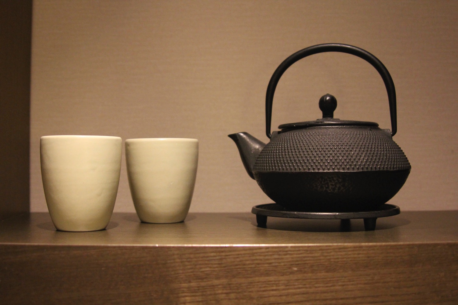 a teapot and two cups