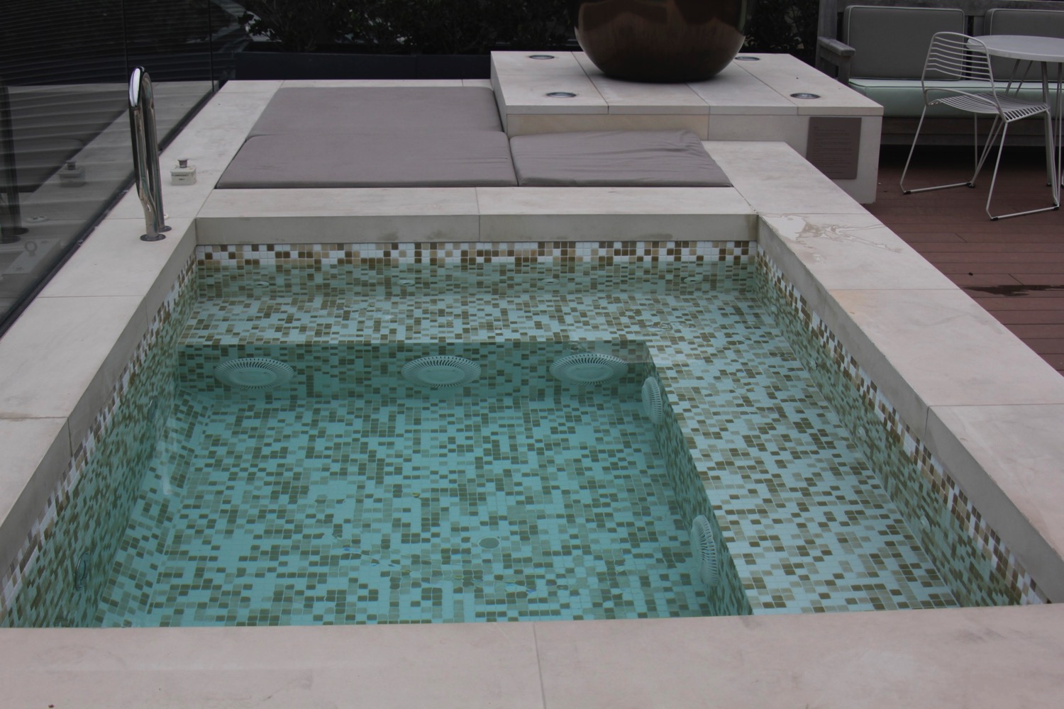 a pool with a tile surface