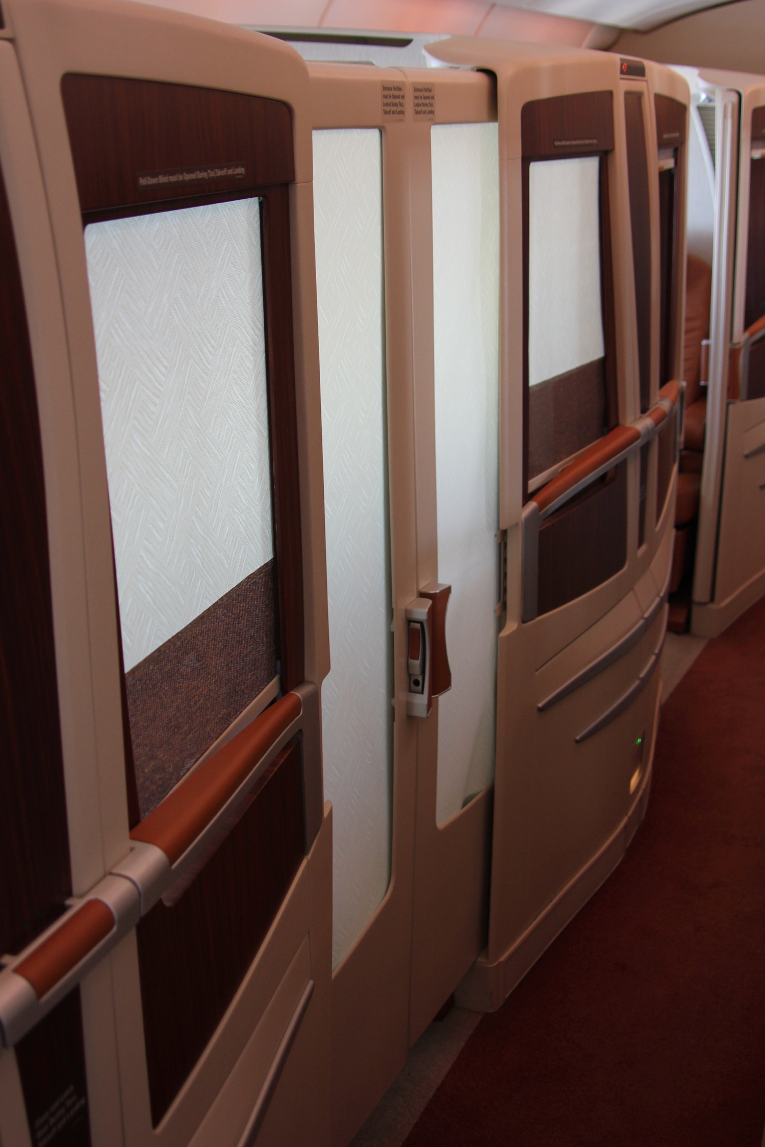 a row of doors on an airplane
