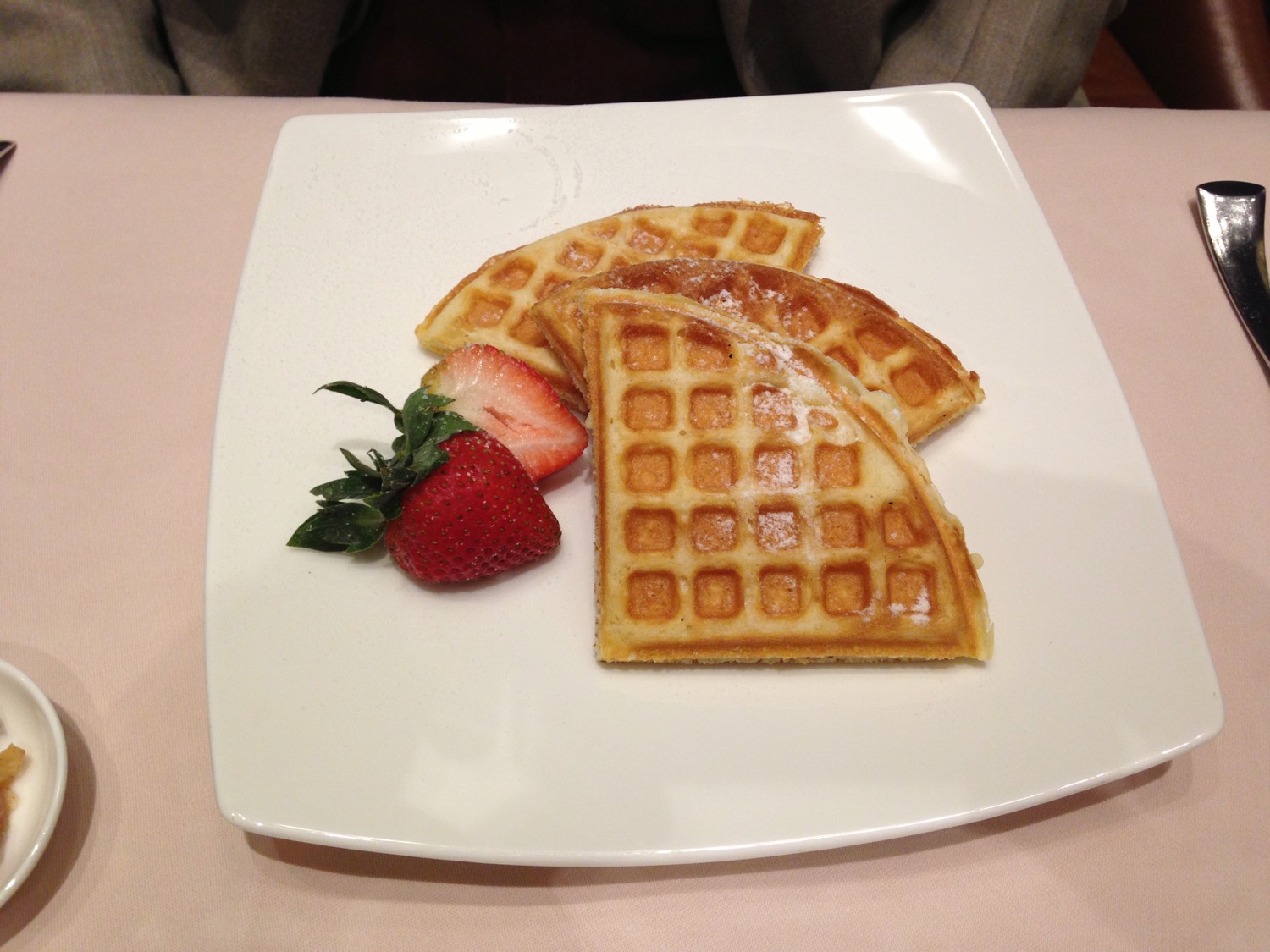 waffles and strawberries on a plate