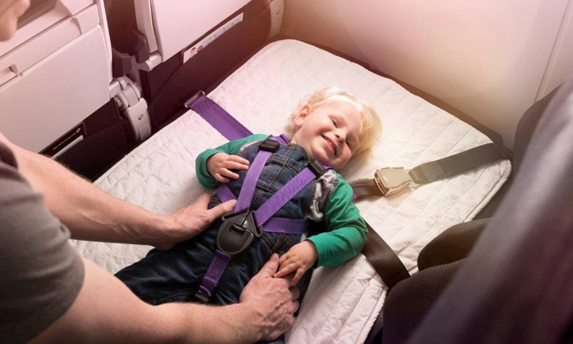 a child in a seat belt