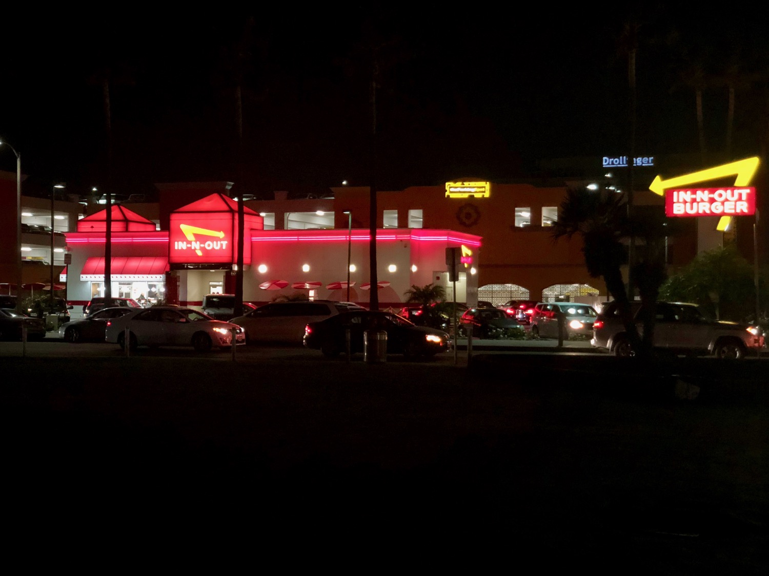 a building with red lights at night