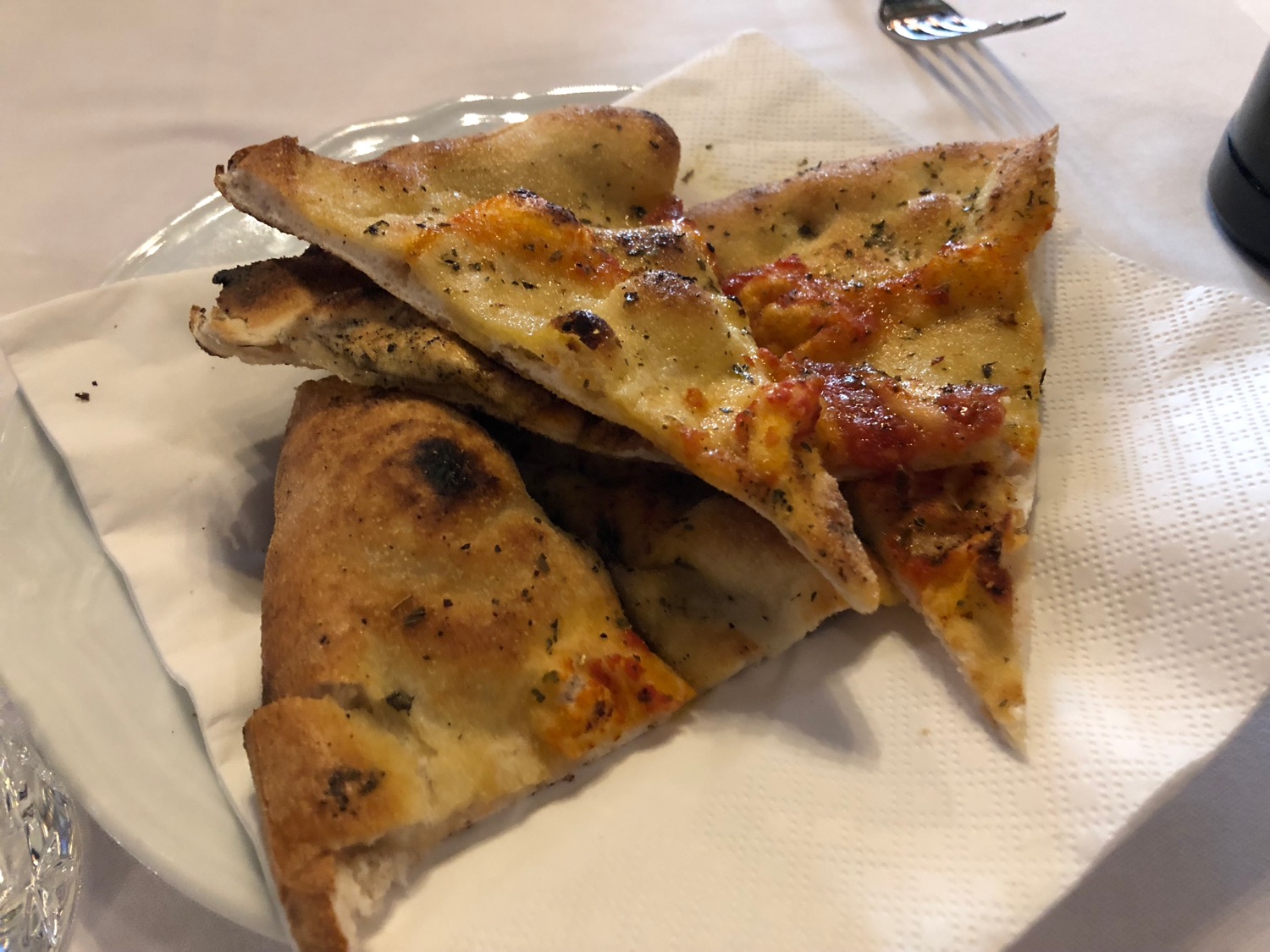 a plate of pizza on a table