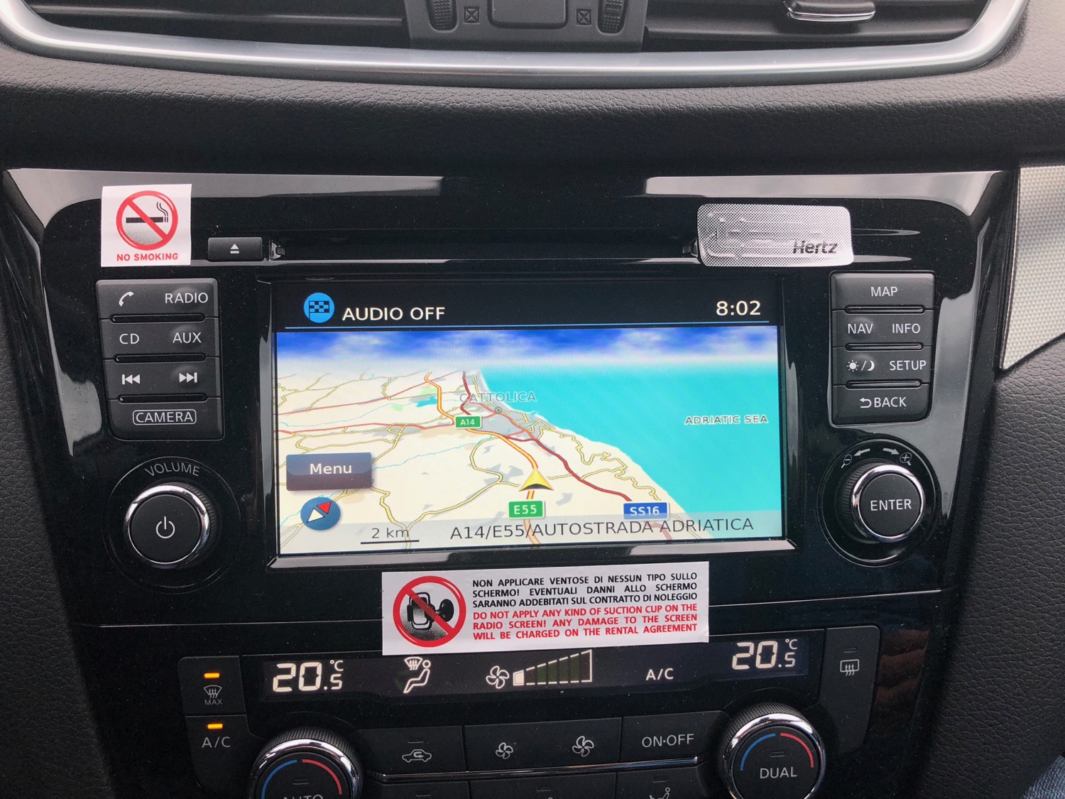 a car dashboard with a map on it