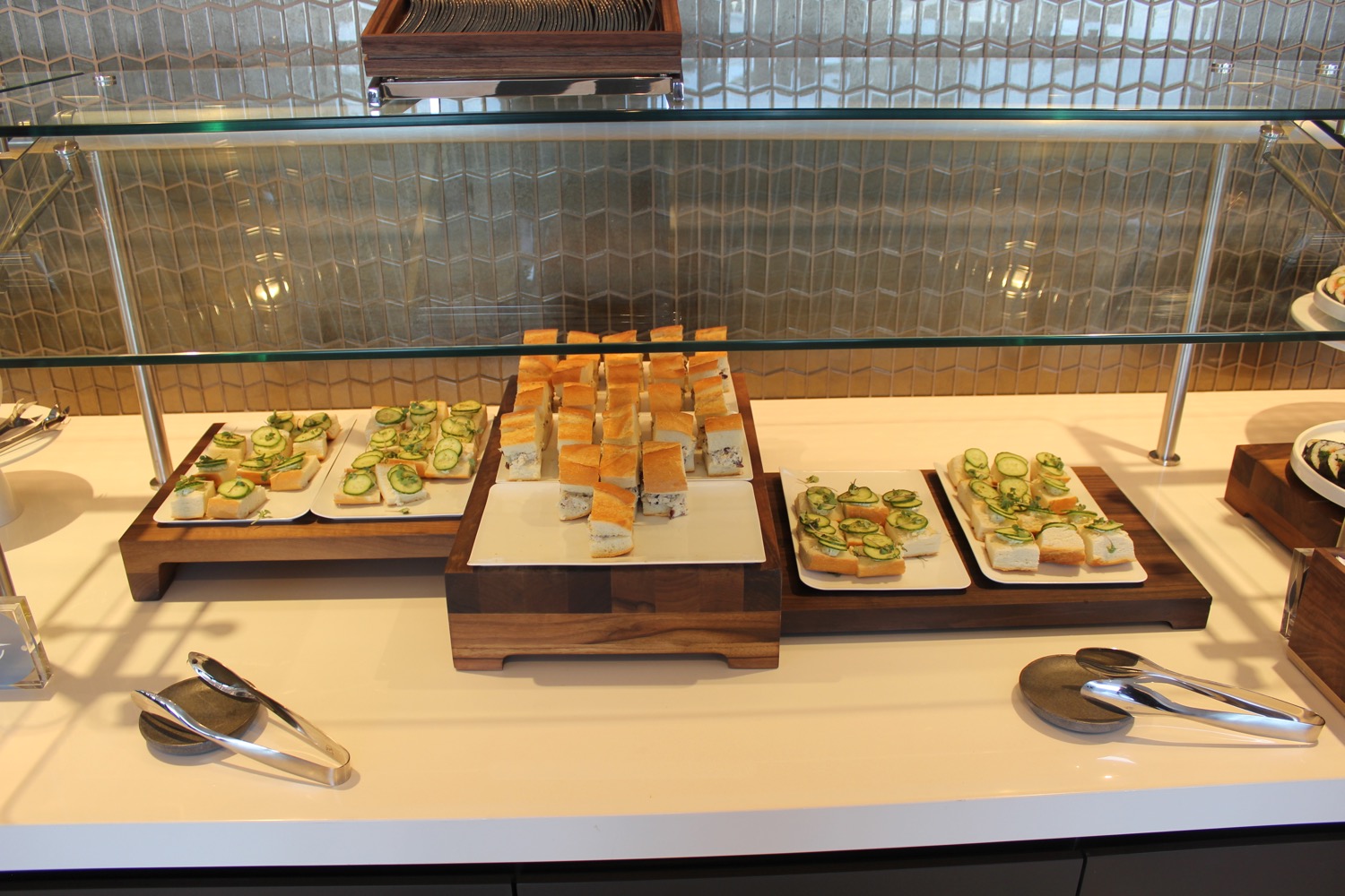 a buffet table with food on plates