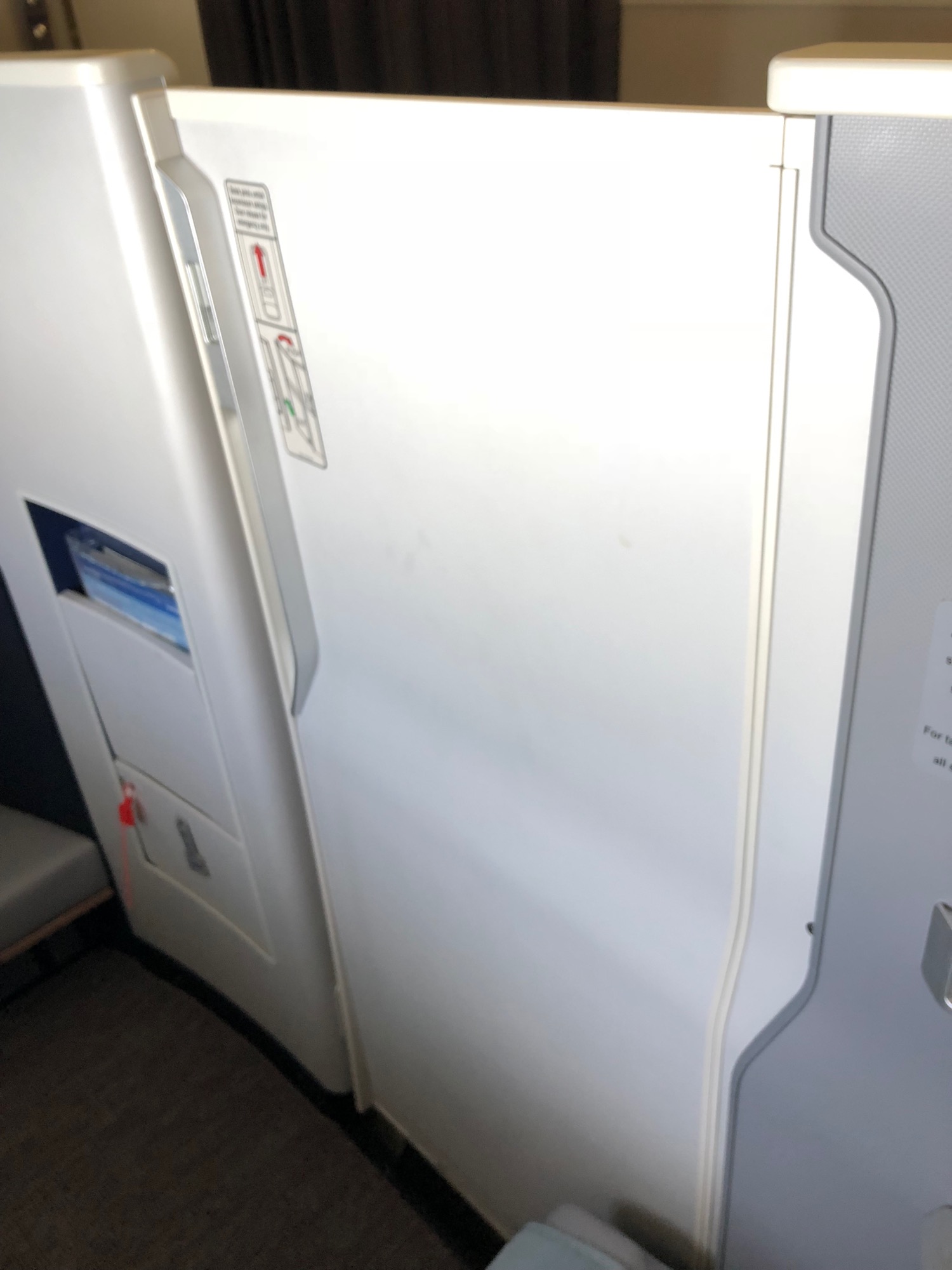 a white door on an airplane