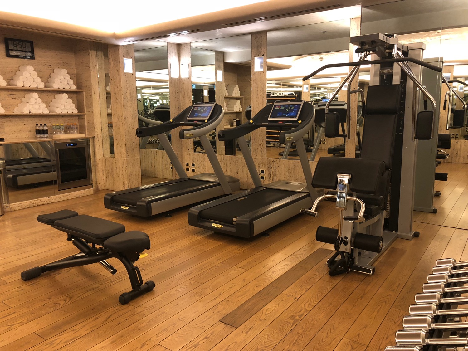 a gym with treadmills and exercise machines