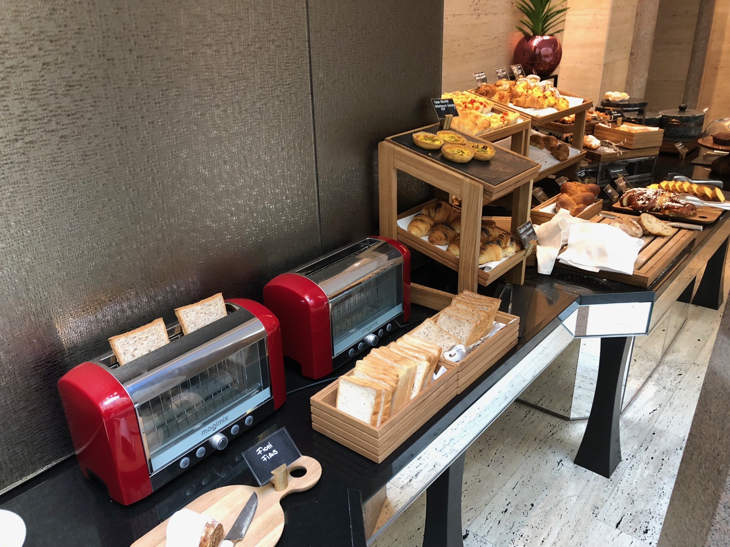 a table with bread and toasters