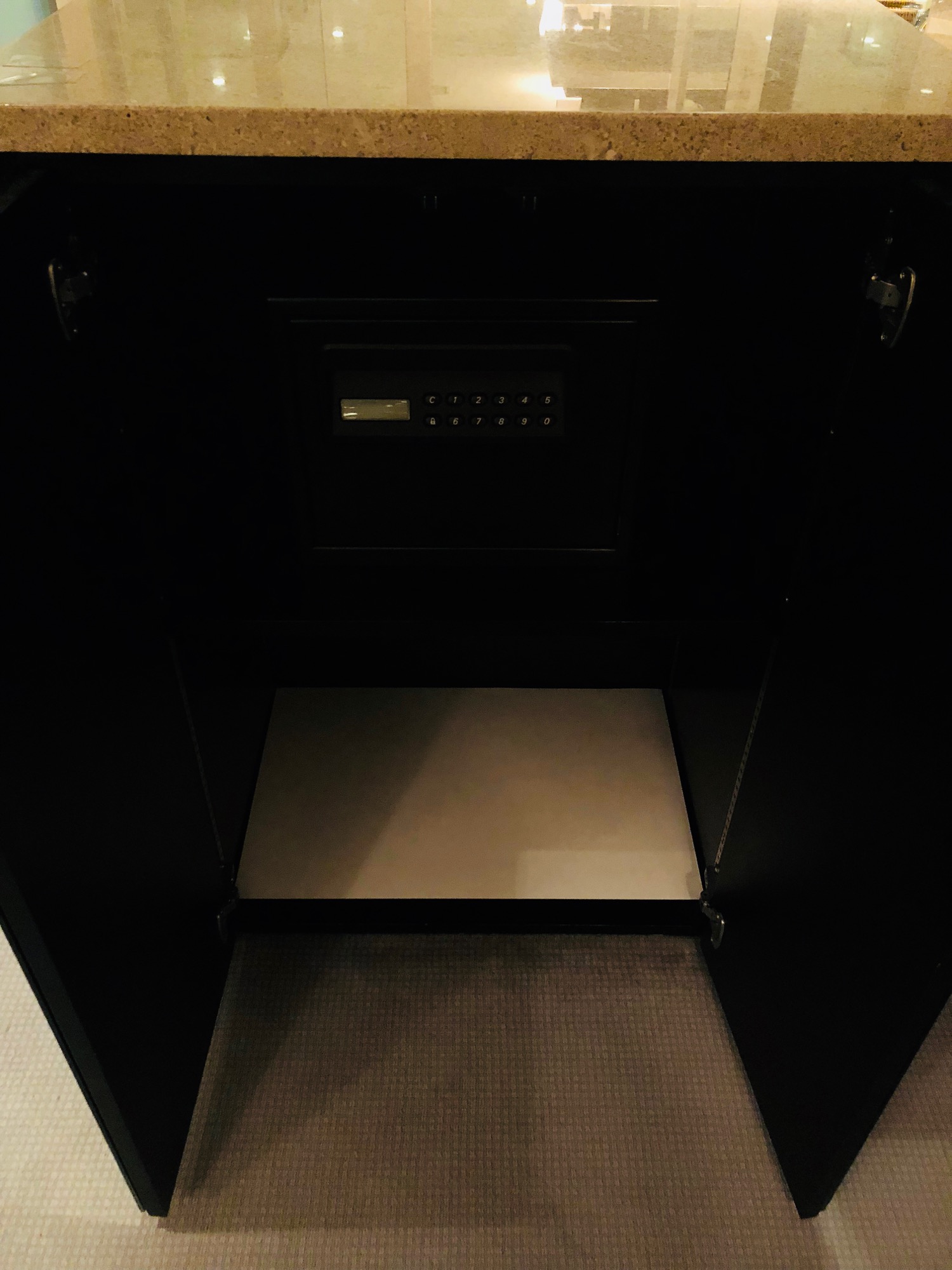 a black cabinet with a lock