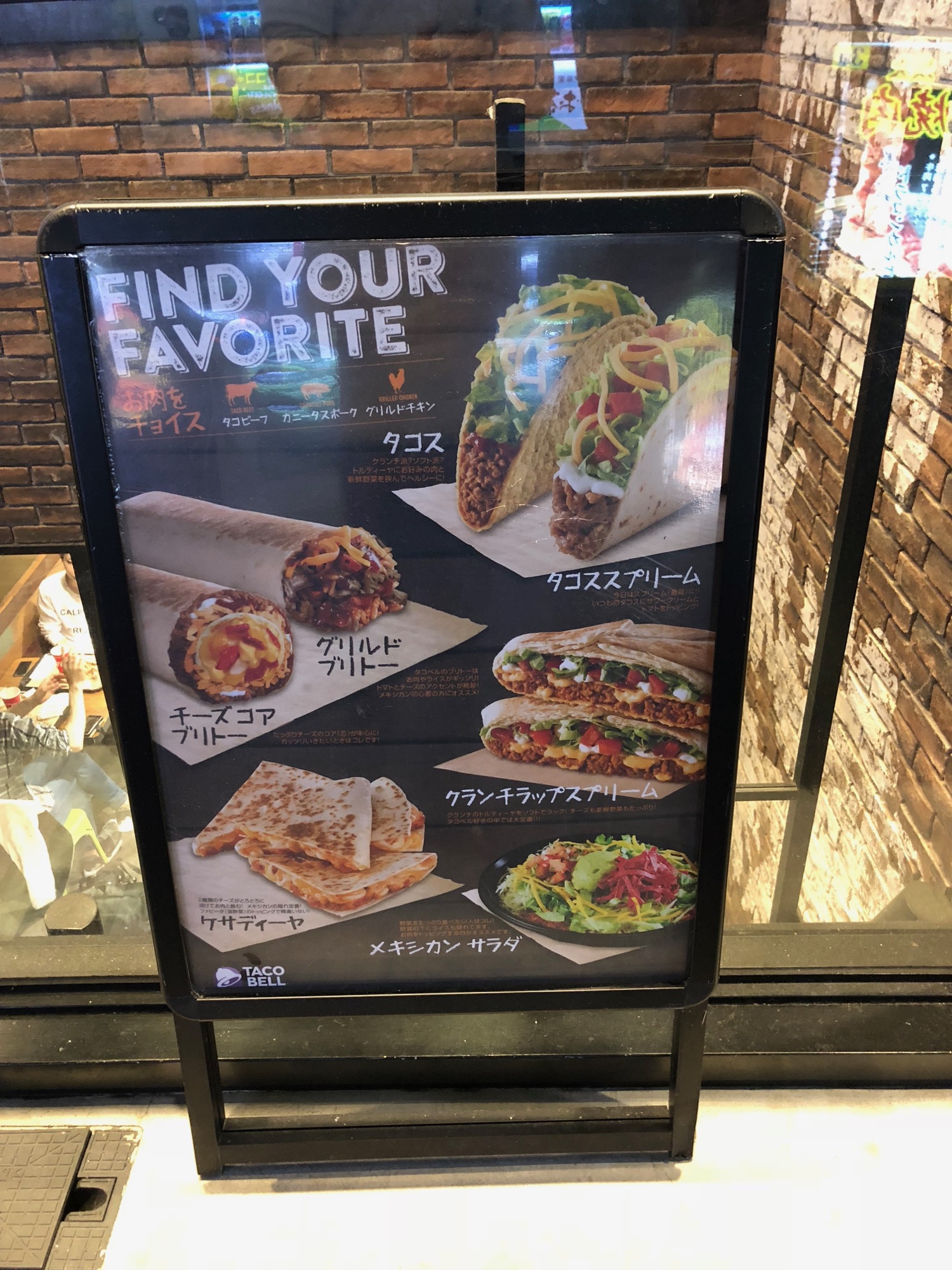 a sign with tacos on it