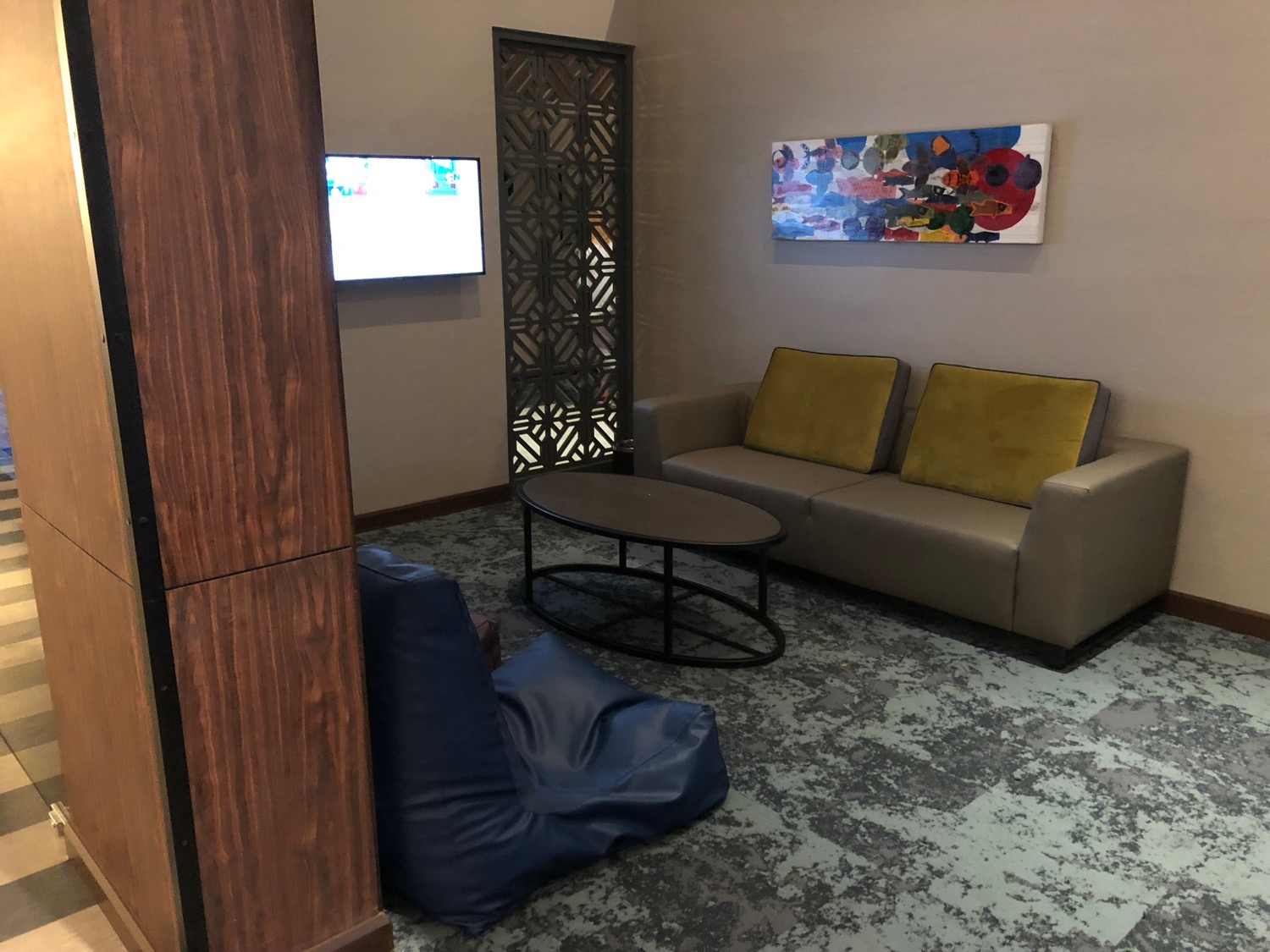 a room with couches and a tv