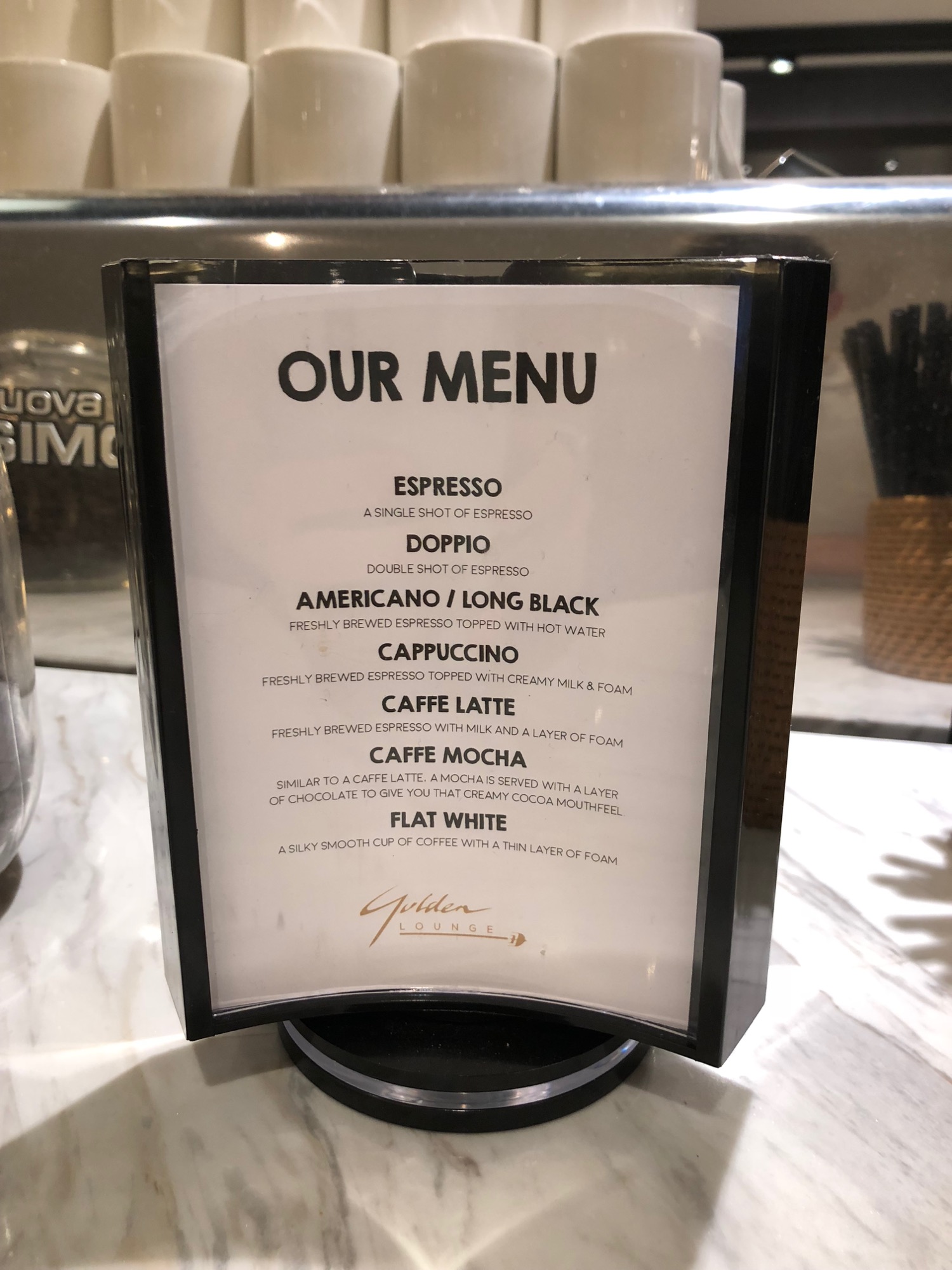 a menu sign on a table
