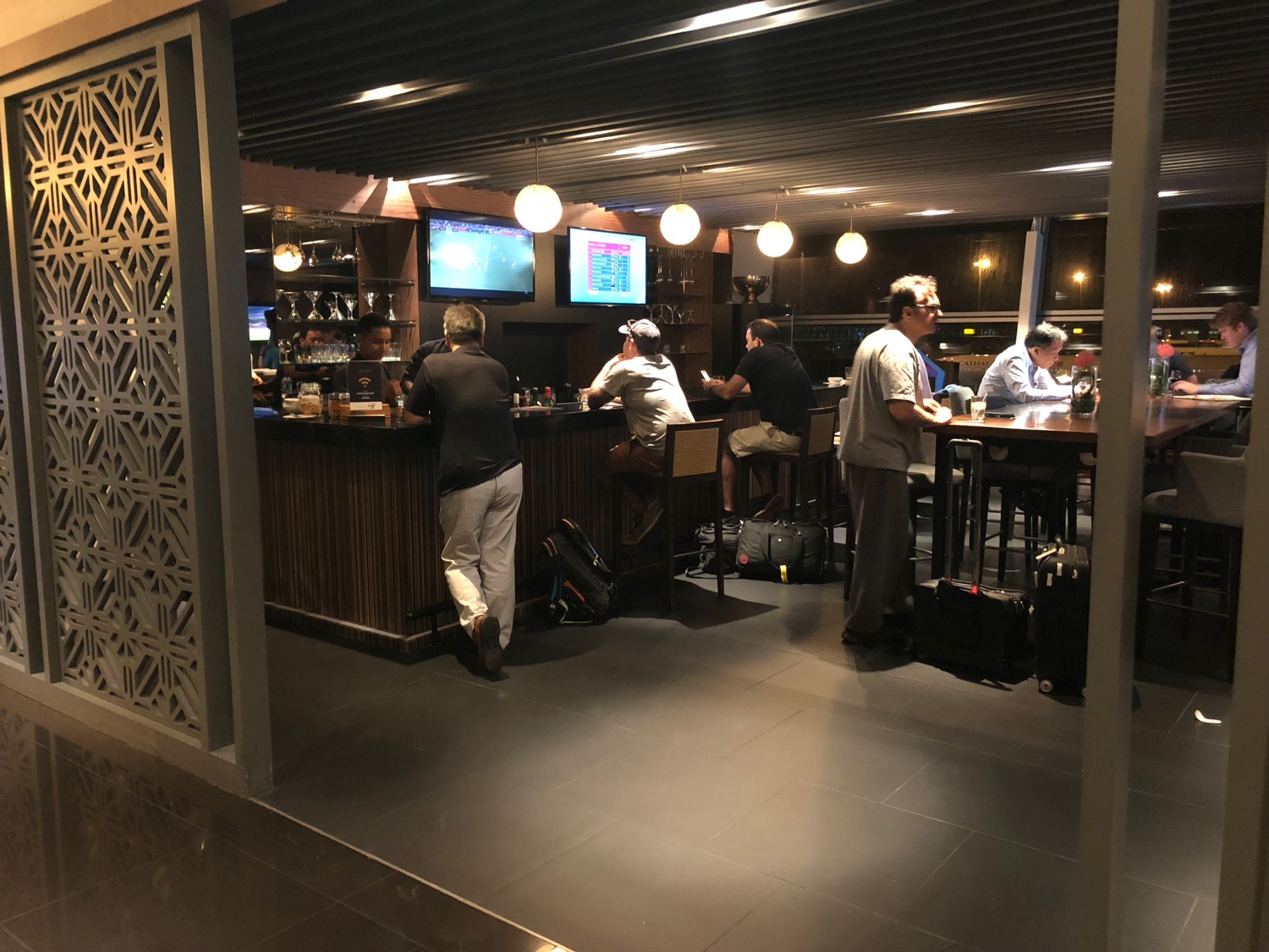 people sitting at a bar