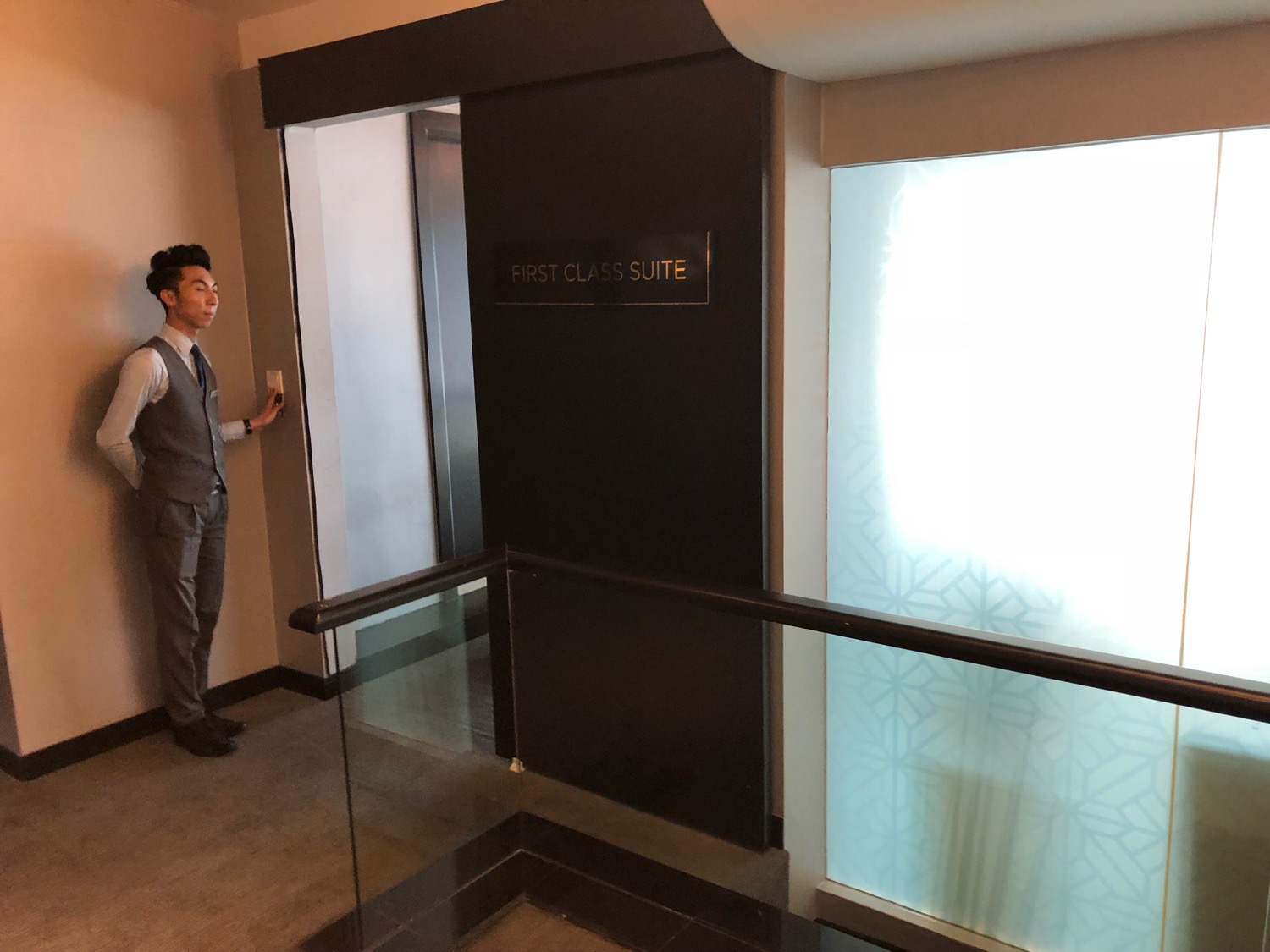 a man standing in an elevator